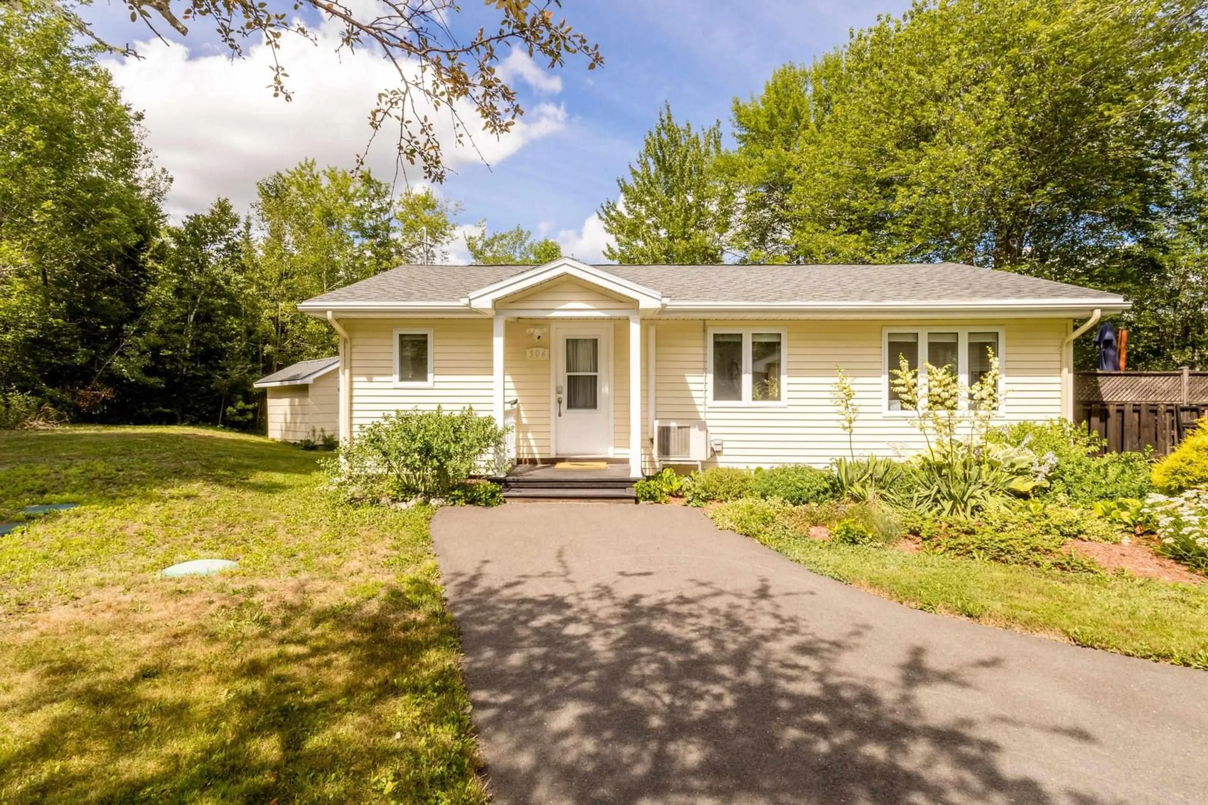 Home with vinyl exterior material, street for 504 Lake Dr, Tupper Lake Nova Scotia B0P 1G0
