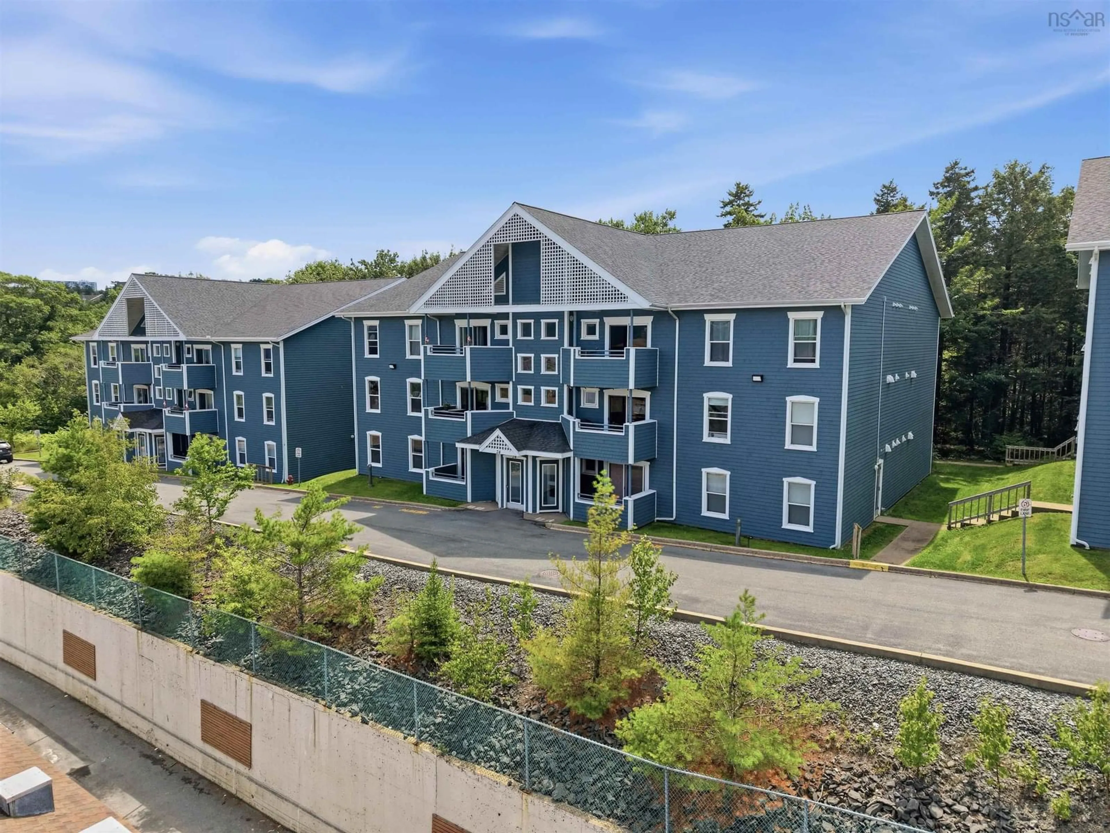A pic from outside/outdoor area/front of a property/back of a property/a pic from drone, building for 24 Hammonds Plains Rd #211, Bedford Nova Scotia B4A 3P3