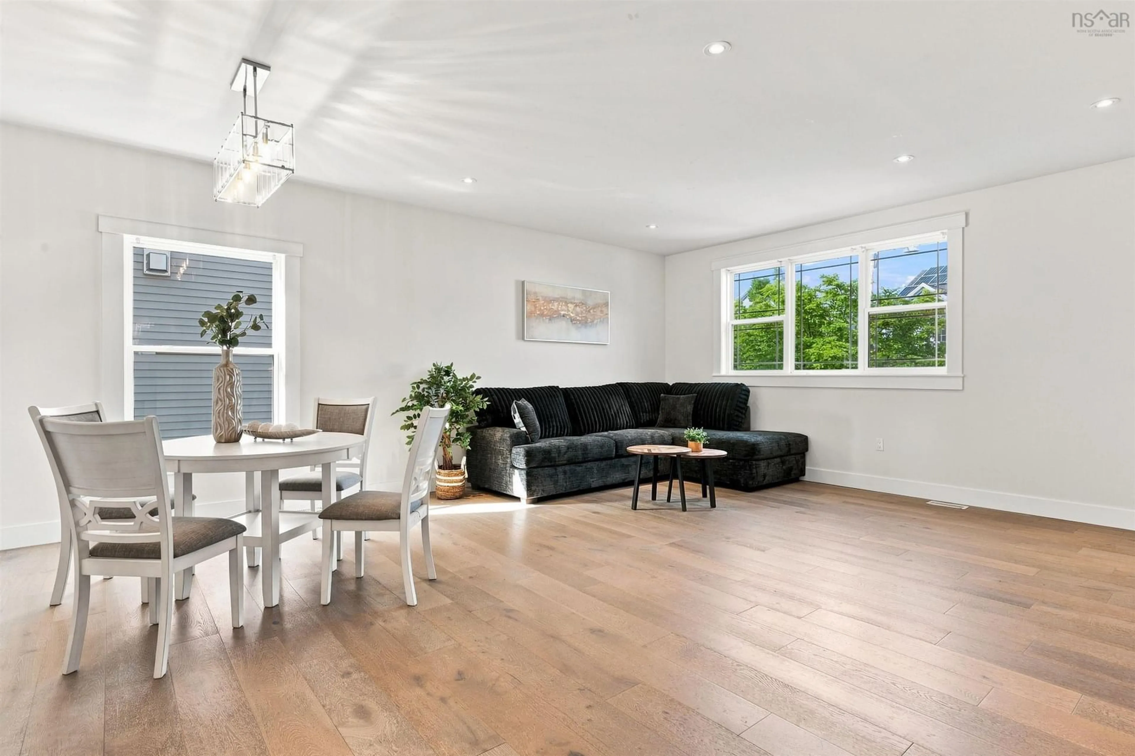 Living room with furniture, wood/laminate floor for 208 Hollyhock Way, Bedford Nova Scotia B4B 0L4