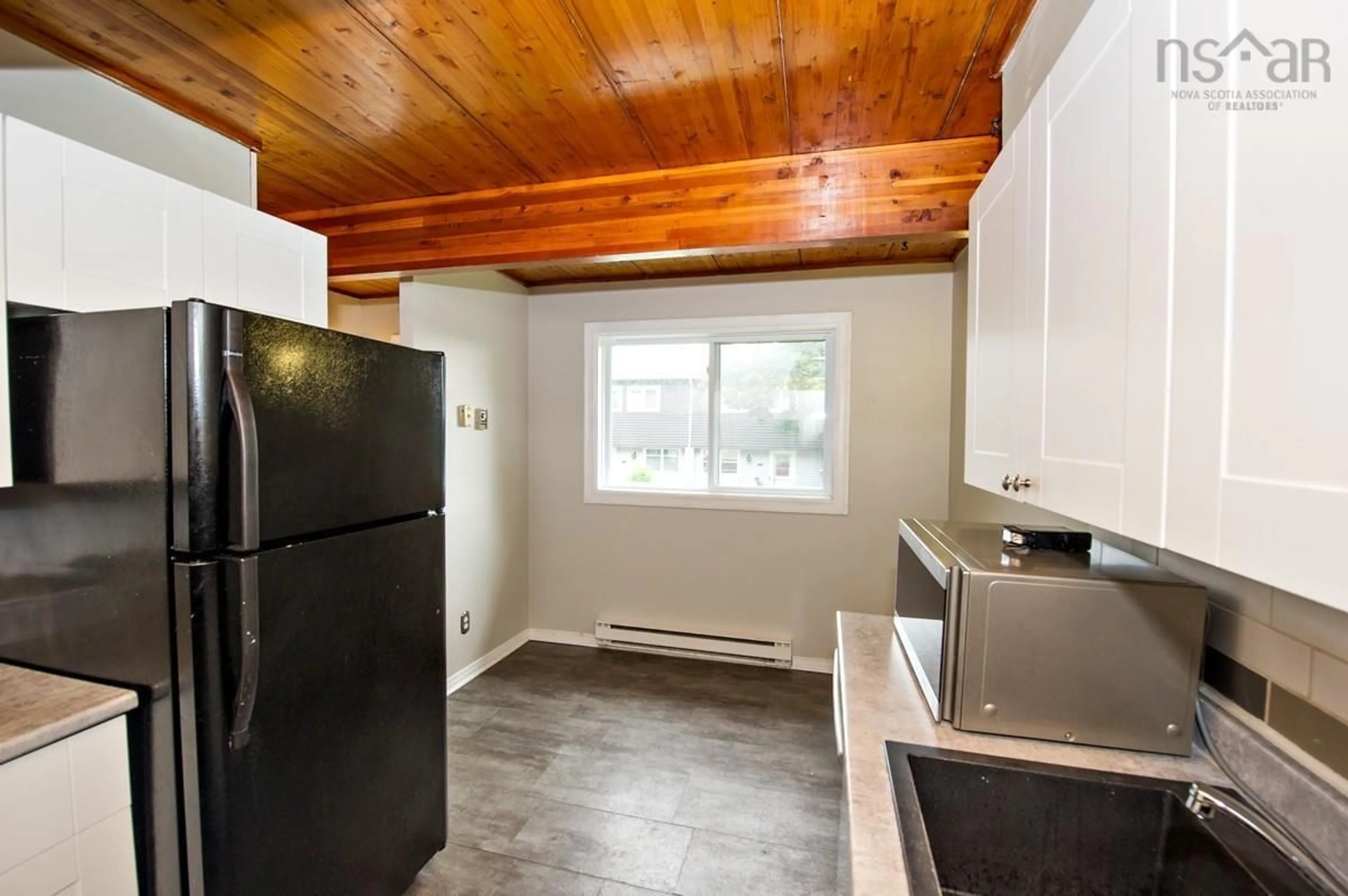 Standard kitchen, wood/laminate floor for 74 Cavendish Rd, Cowie Hill Nova Scotia B3P 2K7