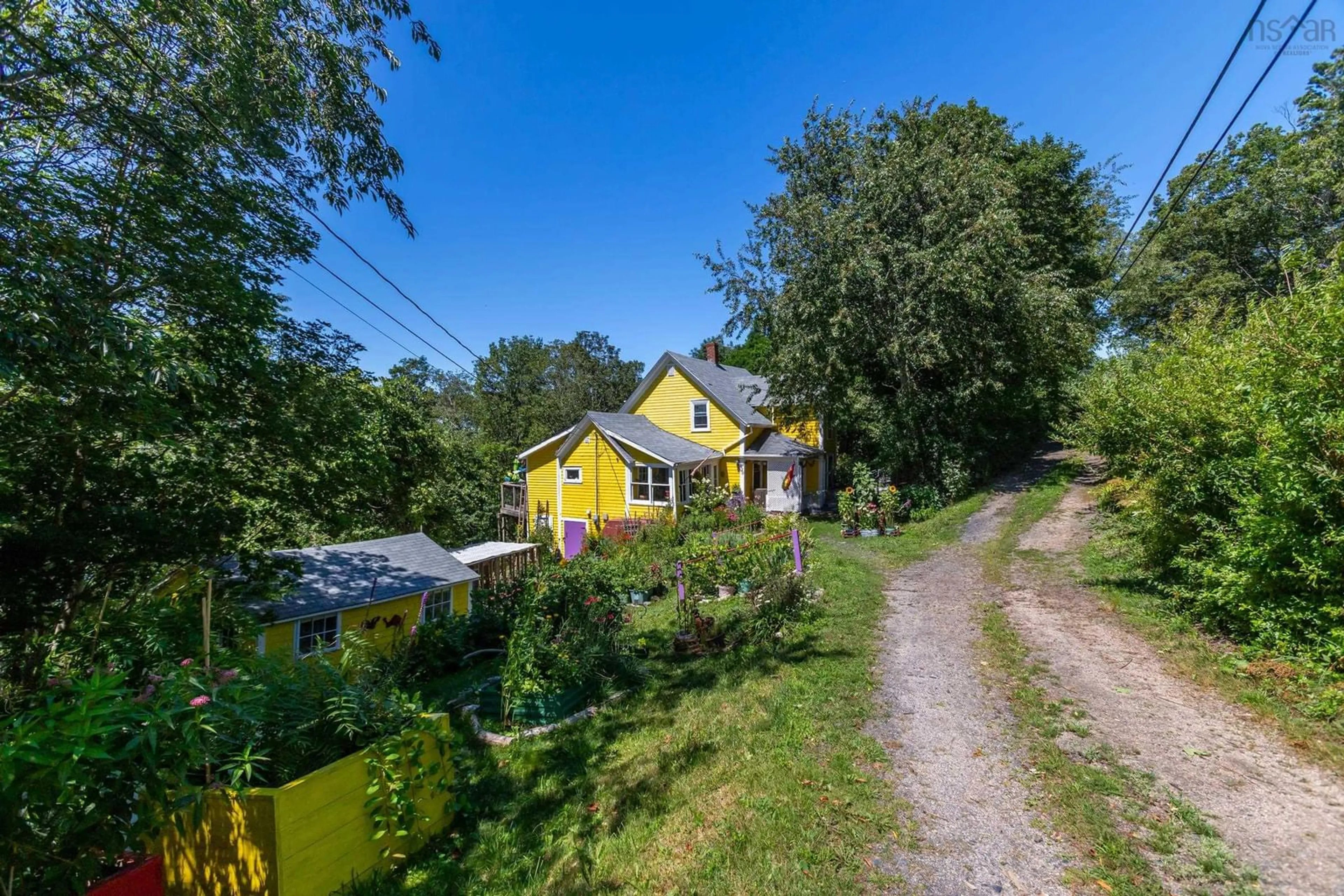 A pic from outside/outdoor area/front of a property/back of a property/a pic from drone, street for 329 Chute Road, Bear River Nova Scotia B0S 1B0