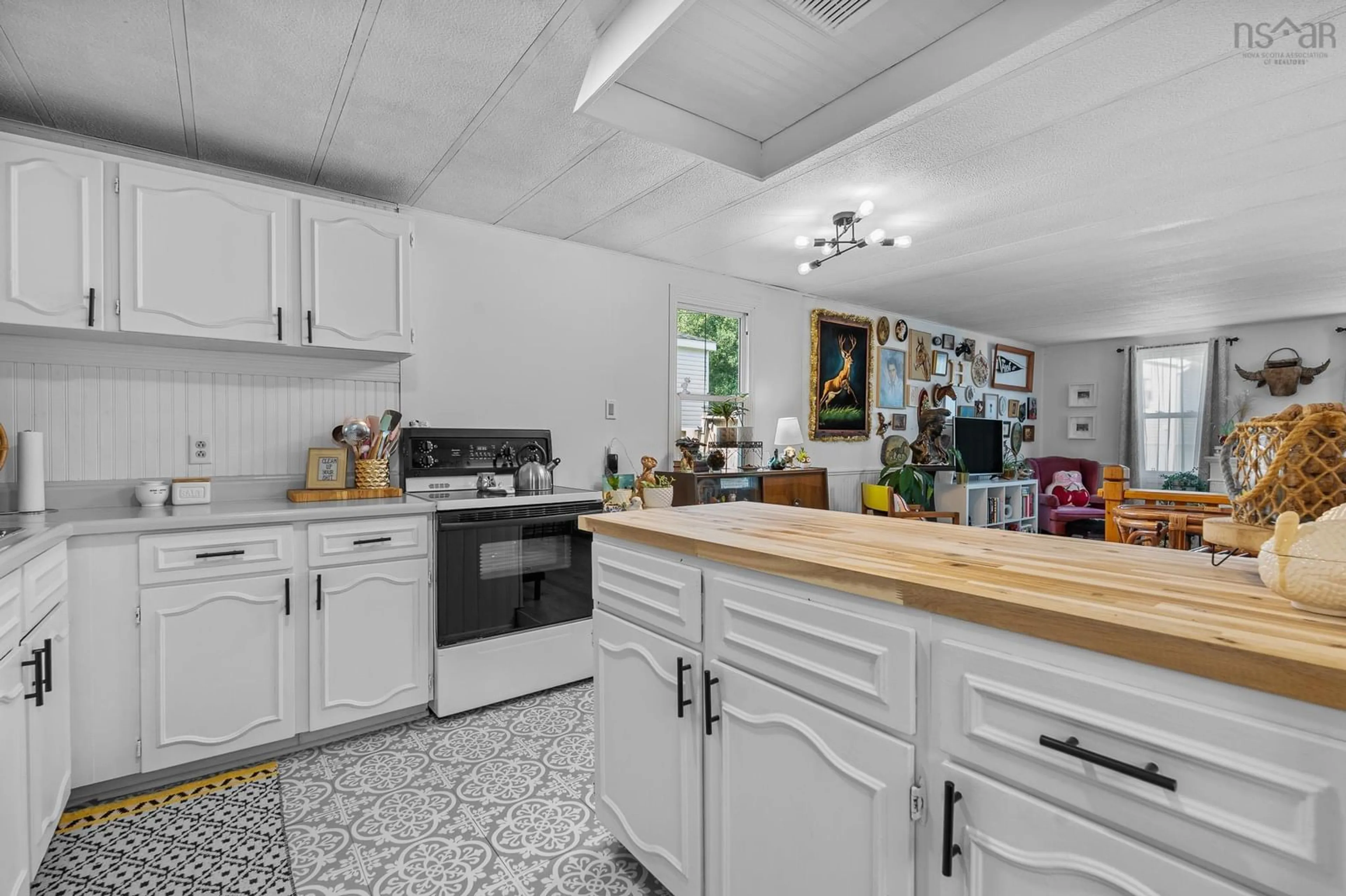 Open concept kitchen, ceramic/tile floor for 47 Stanley St, Middle Sackville Nova Scotia B4E 1E7