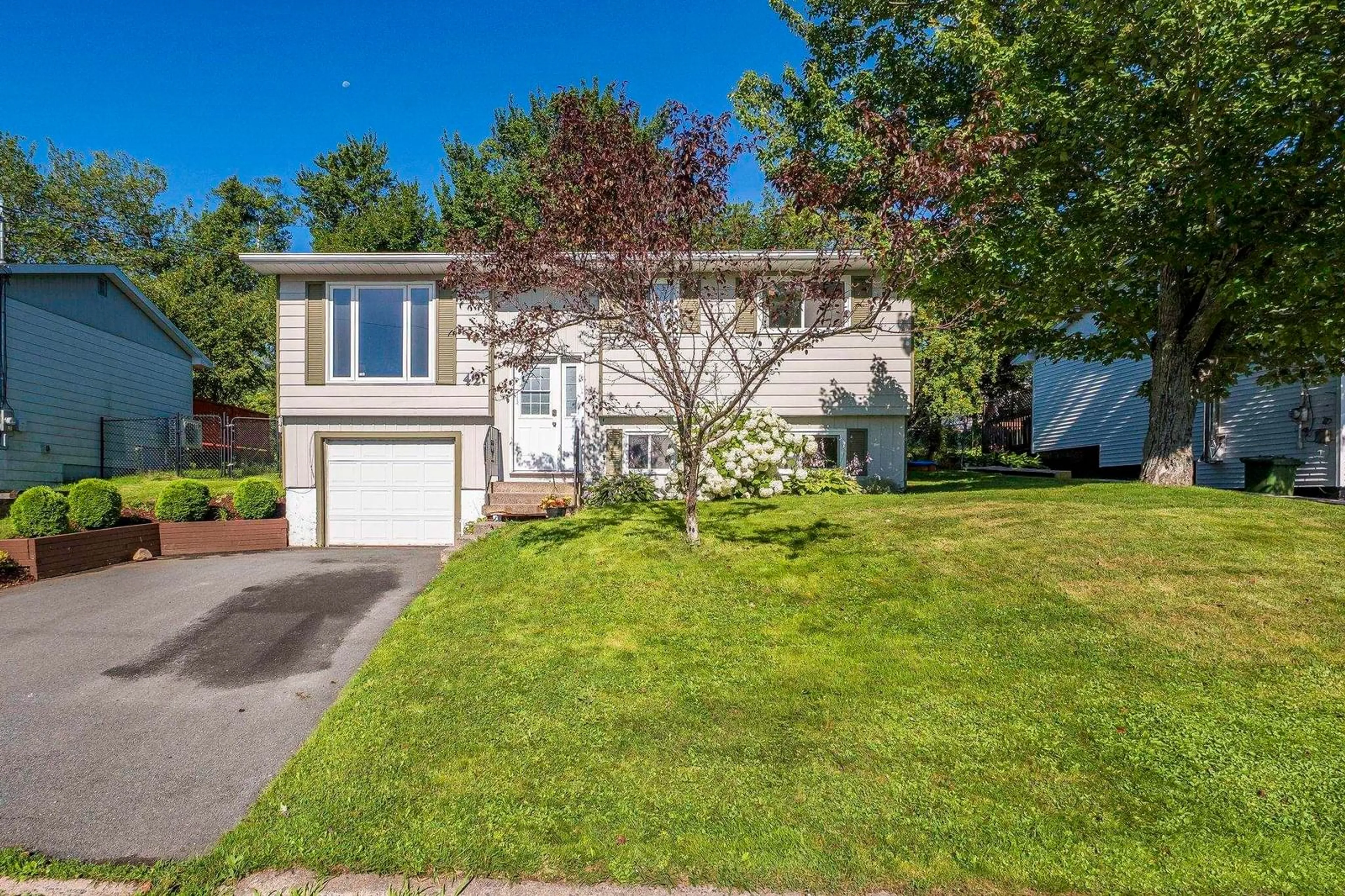 Home with vinyl exterior material, street for 42 Paxton Dr, Cole Harbour Nova Scotia B2W 4T2