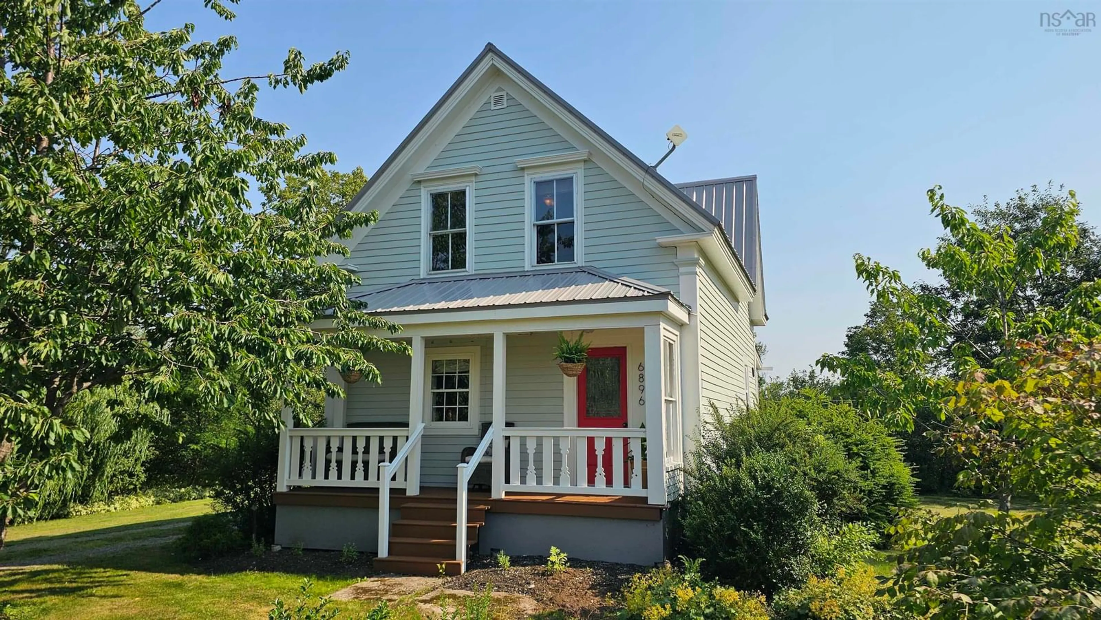 Home with vinyl exterior material, street for 6896 Highway 2, Portapique Nova Scotia B0M 1B0