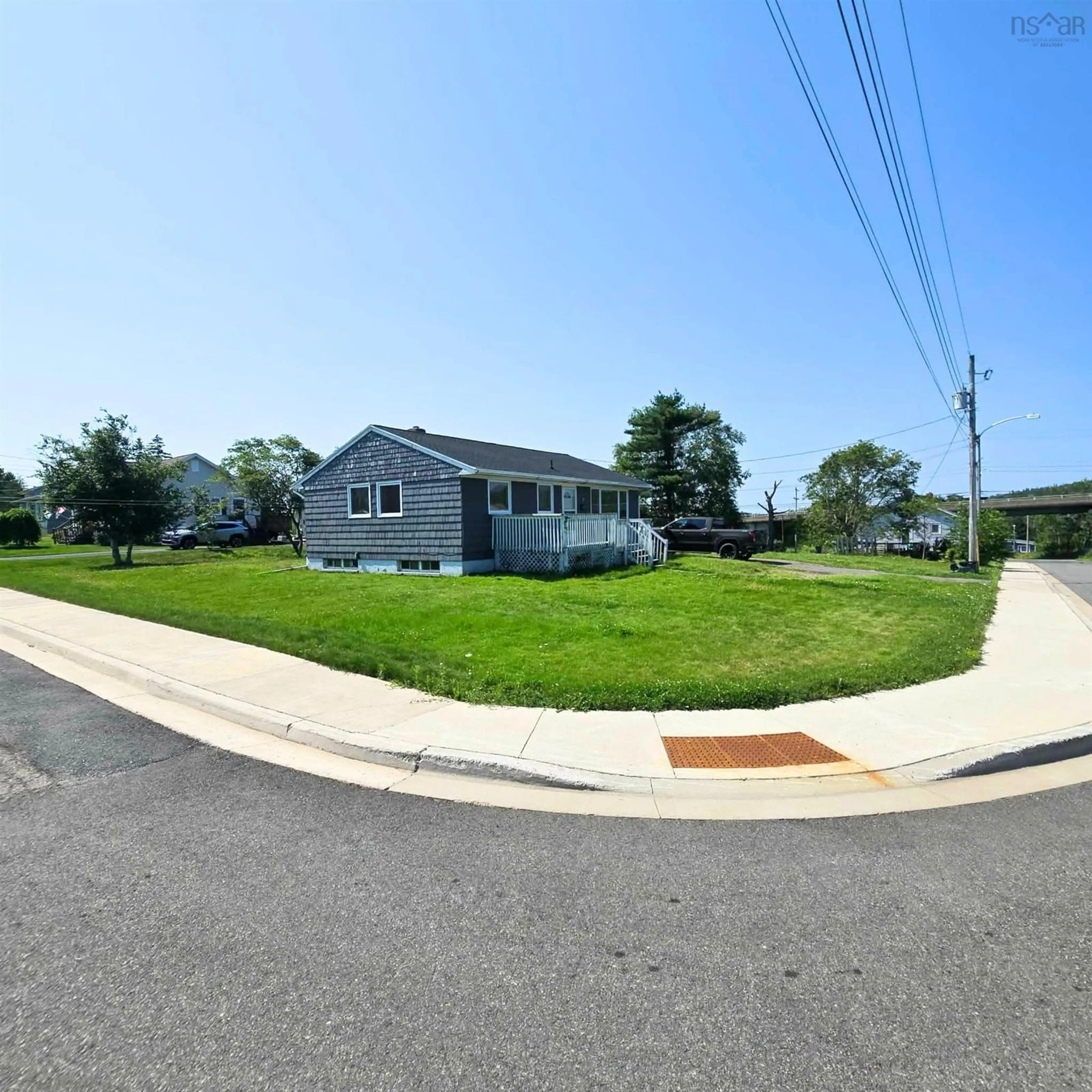 A pic from outside/outdoor area/front of a property/back of a property/a pic from drone, street for 7 Cartwright St, North Sydney Nova Scotia B2A 3G7