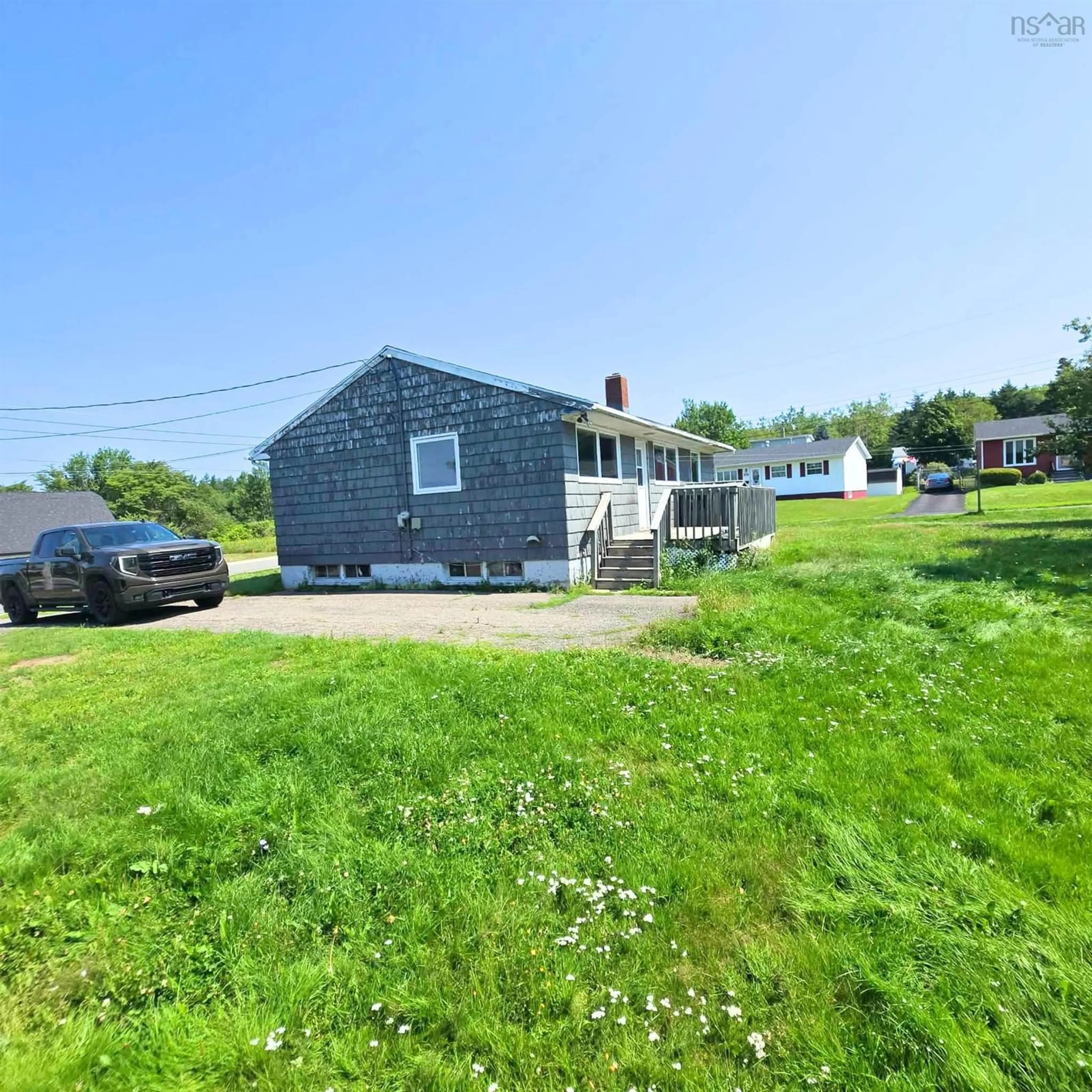A pic from outside/outdoor area/front of a property/back of a property/a pic from drone, unknown for 7 Cartwright St, North Sydney Nova Scotia B2A 3G7