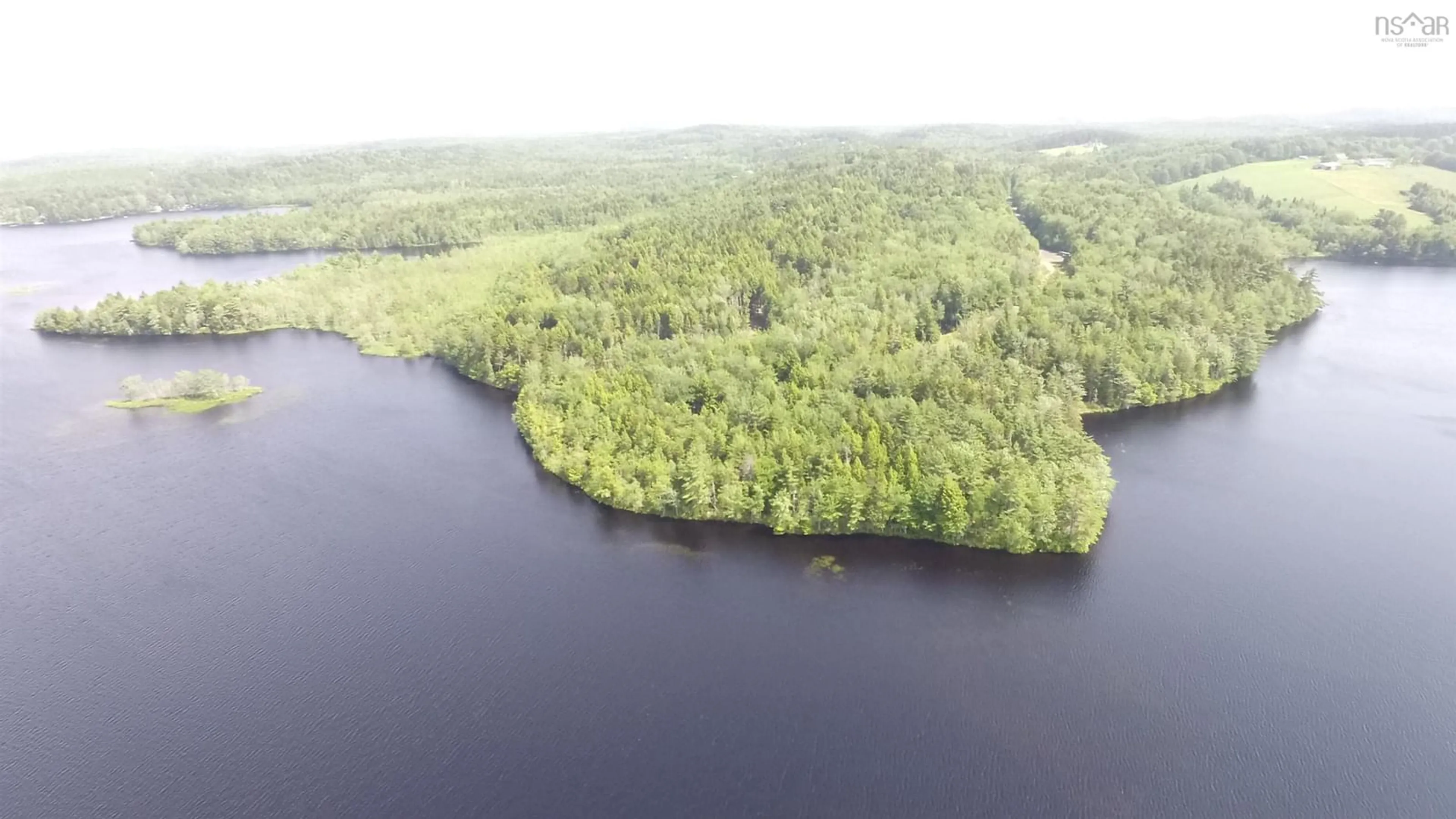 A pic from outside/outdoor area/front of a property/back of a property/a pic from drone, water/lake/river/ocean view for 63 Frank Rd, Italy Cross Nova Scotia B4V 0N3