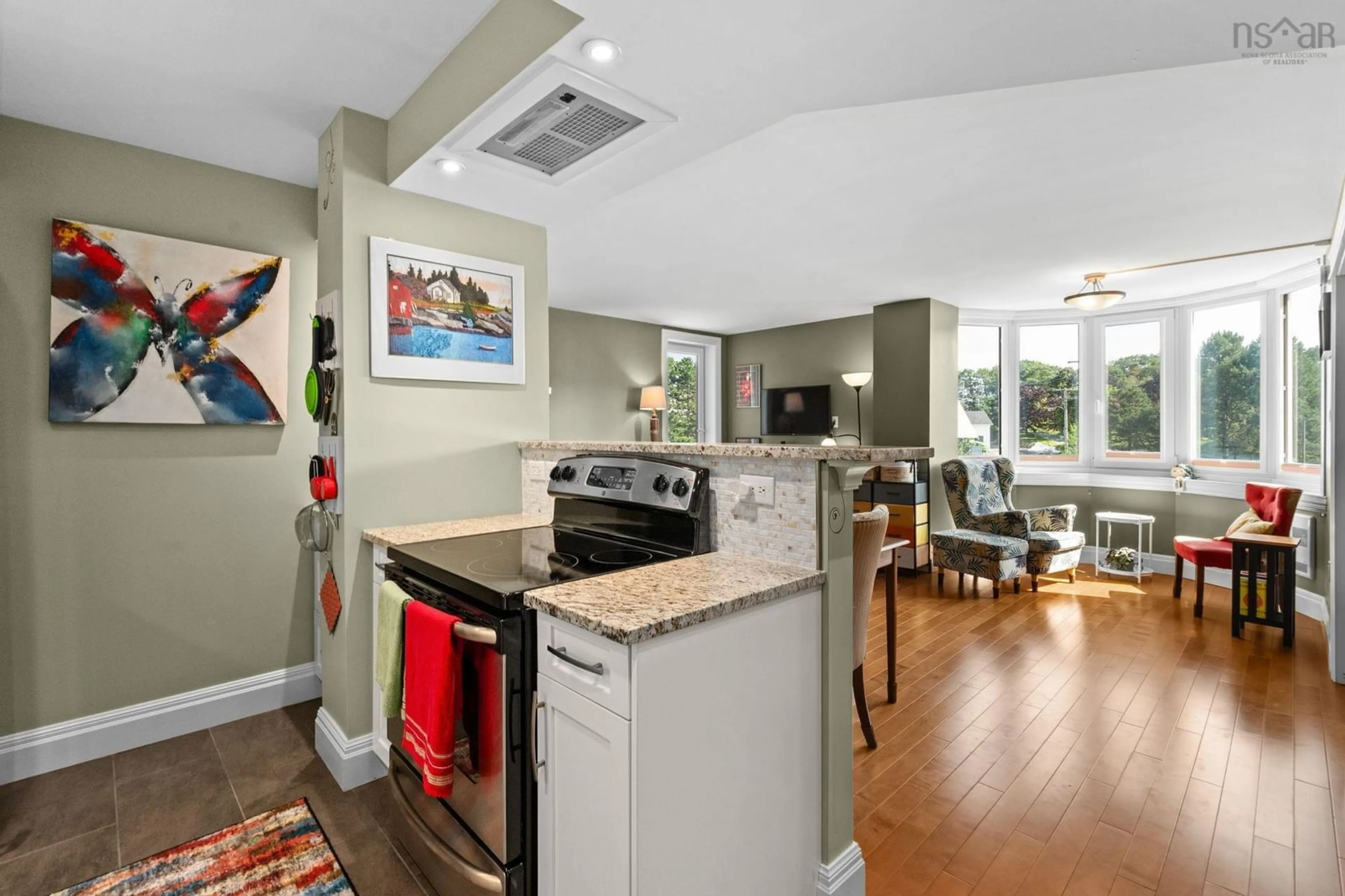 Open concept kitchen, ceramic/tile floor for 45 Vimy Ave #323, Halifax Nova Scotia B3M 4C5