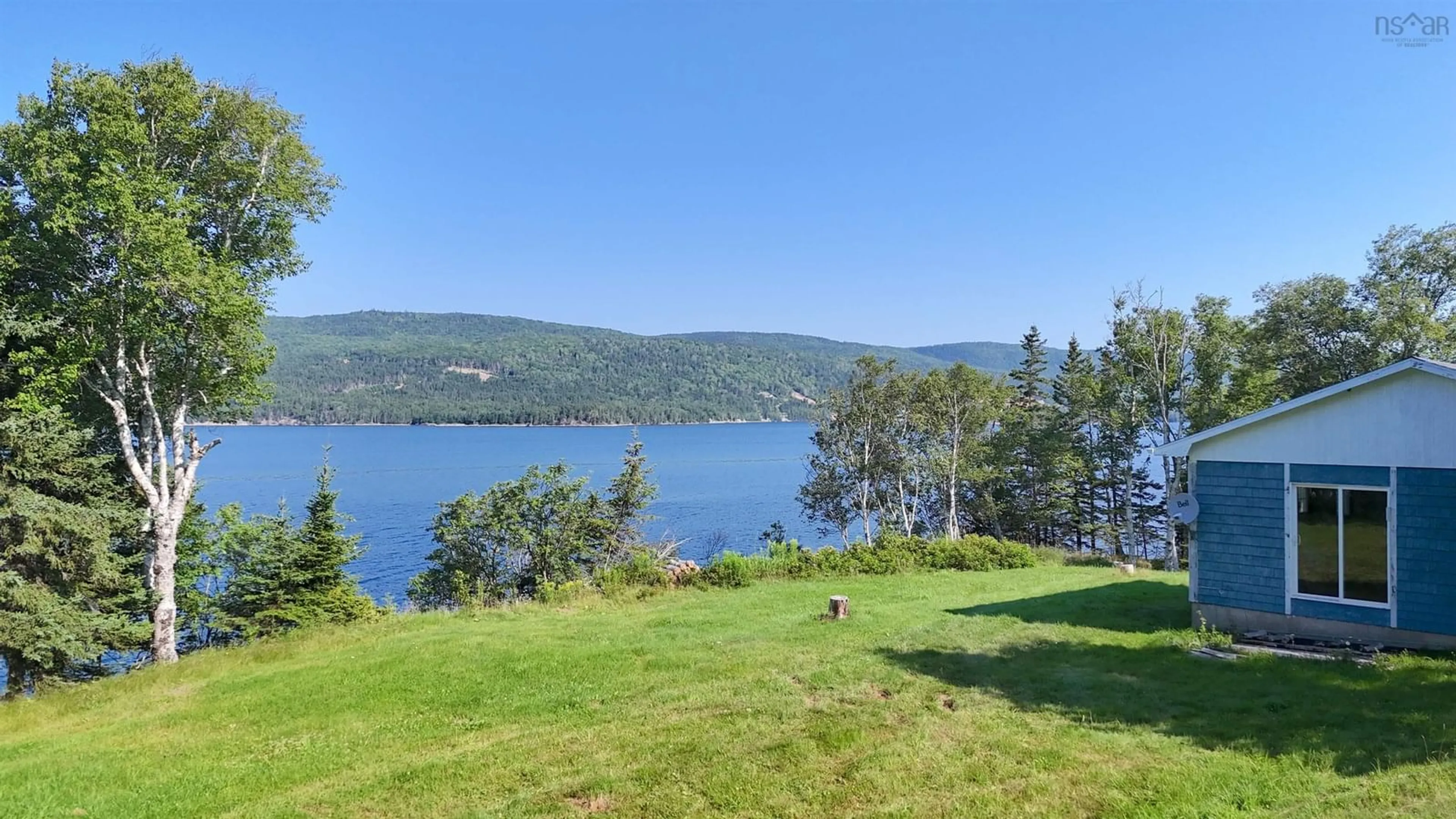 A pic from outside/outdoor area/front of a property/back of a property/a pic from drone, water/lake/river/ocean view for 11805 Kempt Head Rd, Boularderie Centre Nova Scotia B1X 1K5