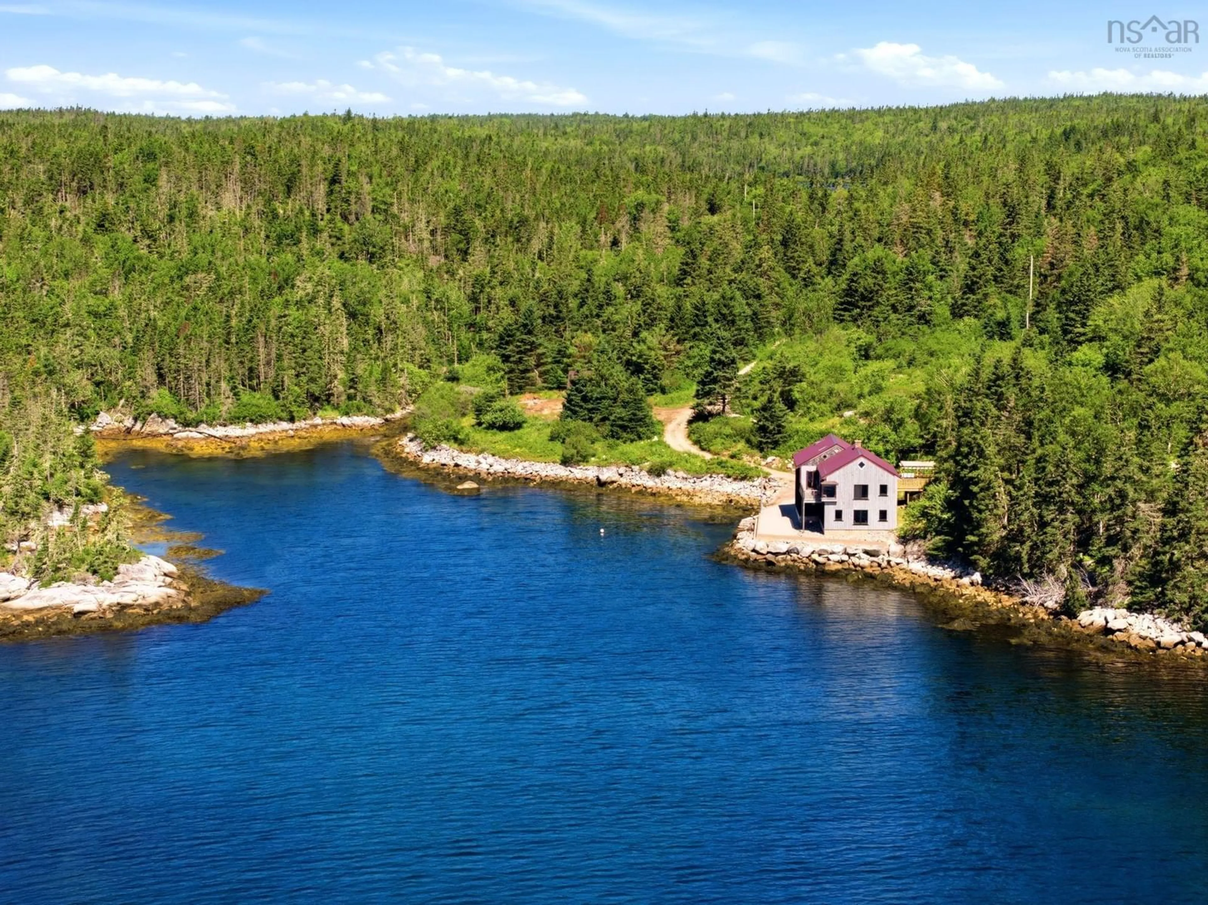 A pic from outside/outdoor area/front of a property/back of a property/a pic from drone, water/lake/river/ocean view for 3087 Highway 329, Northwest Cove Nova Scotia B0J 1T0