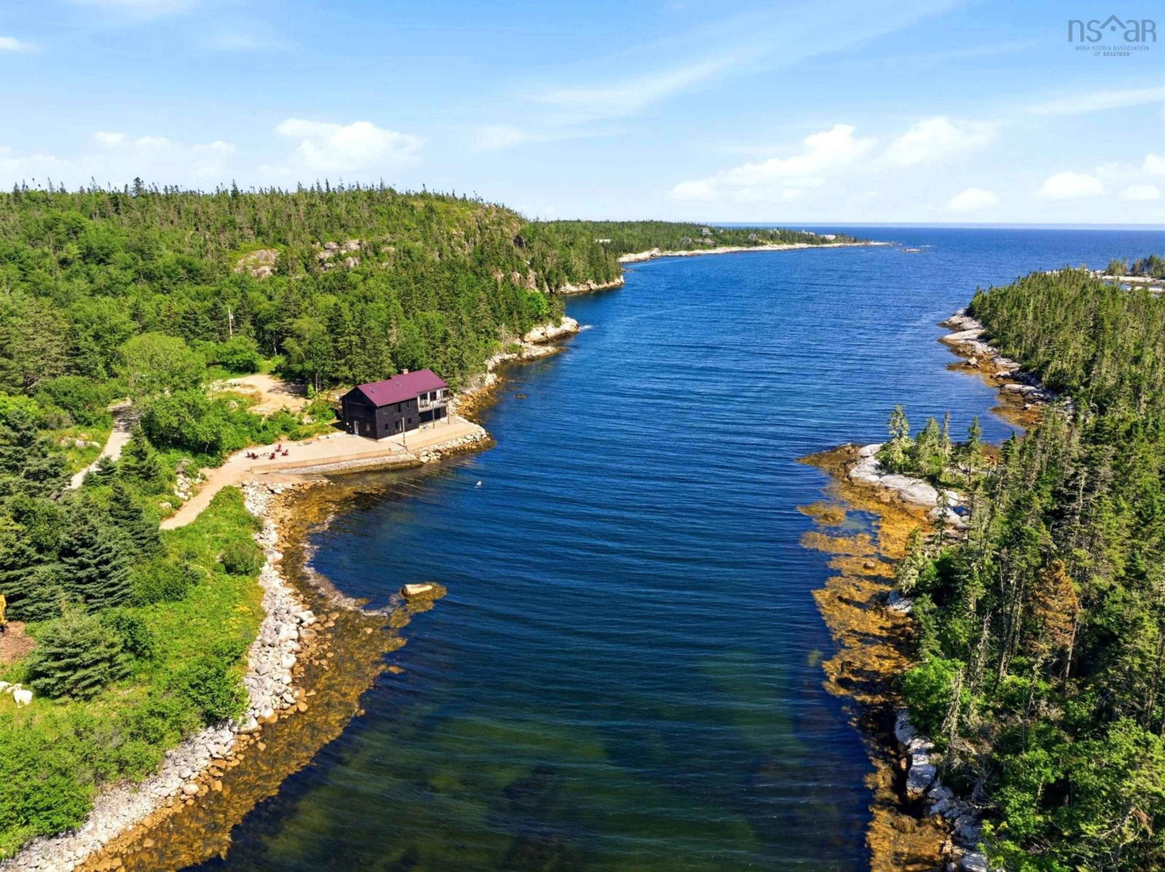 A pic from outside/outdoor area/front of a property/back of a property/a pic from drone, water/lake/river/ocean view for 3087 Highway 329, Northwest Cove Nova Scotia B0J 1T0