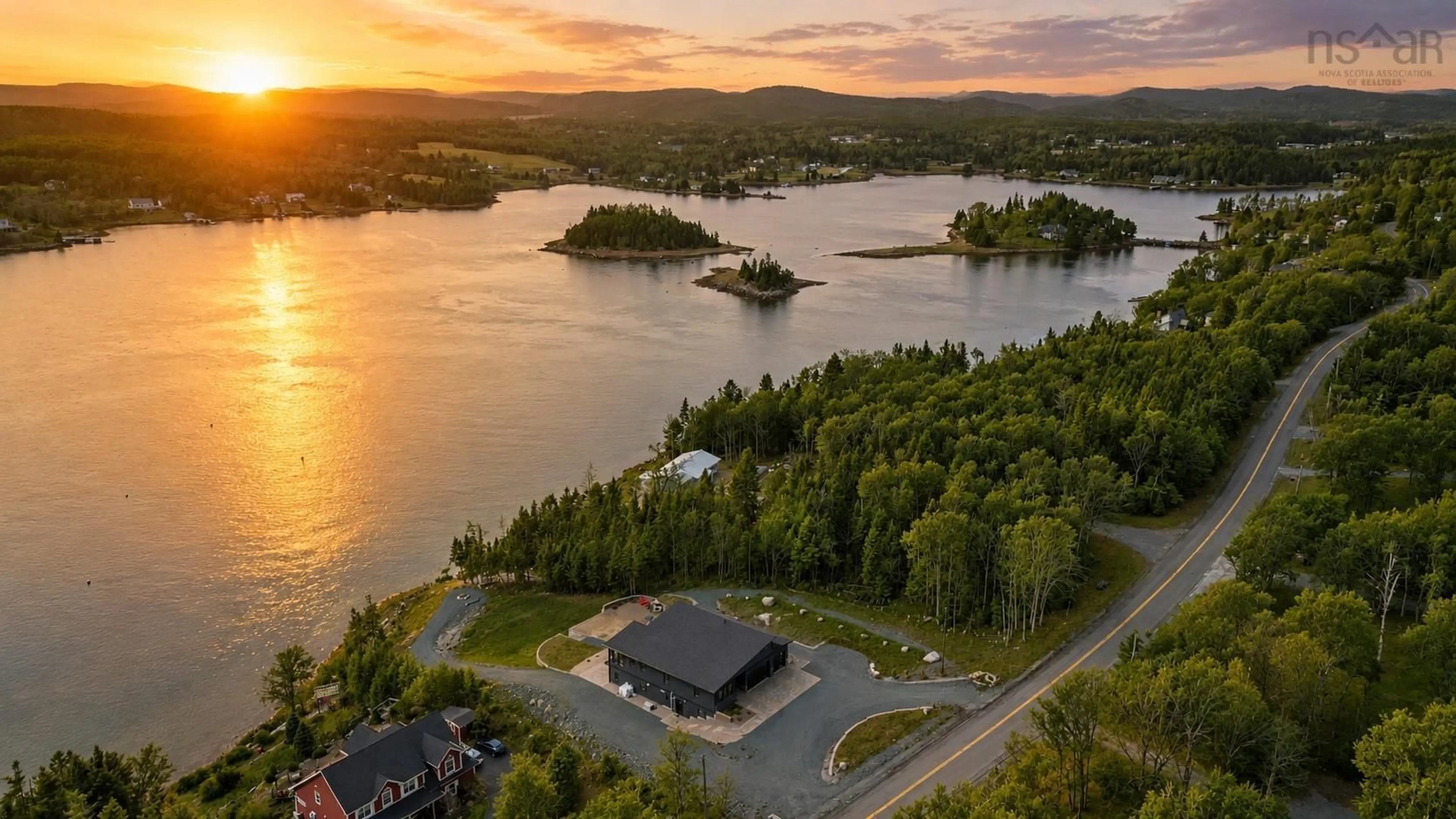 A pic from outside/outdoor area/front of a property/back of a property/a pic from drone, water/lake/river/ocean view for 398 East Petpeswick Rd, East Petpeswick Nova Scotia B0J 2L0