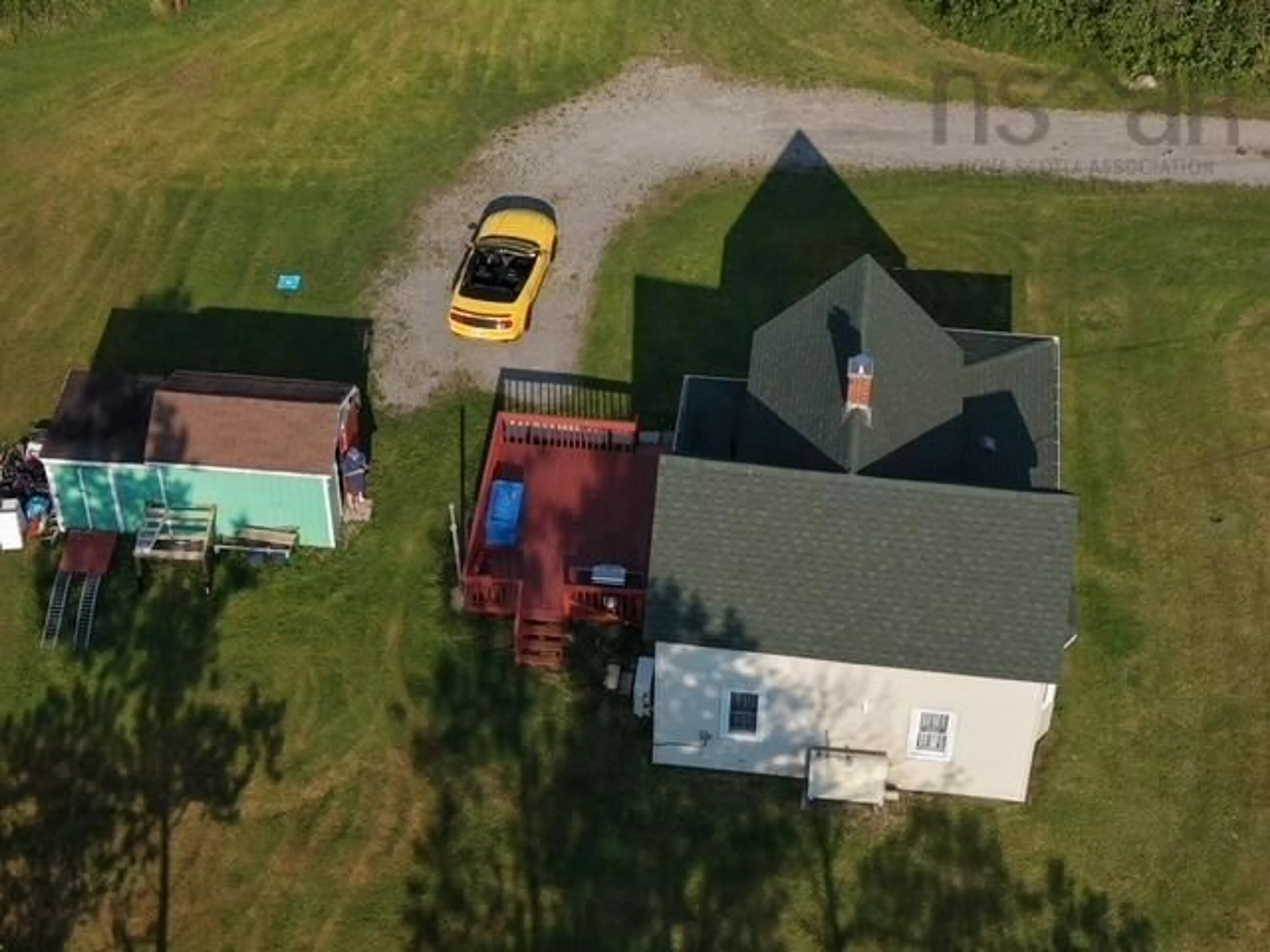 A pic from outside/outdoor area/front of a property/back of a property/a pic from drone, street for 1129 Main St, Sydney Mines Nova Scotia B1V 2M8