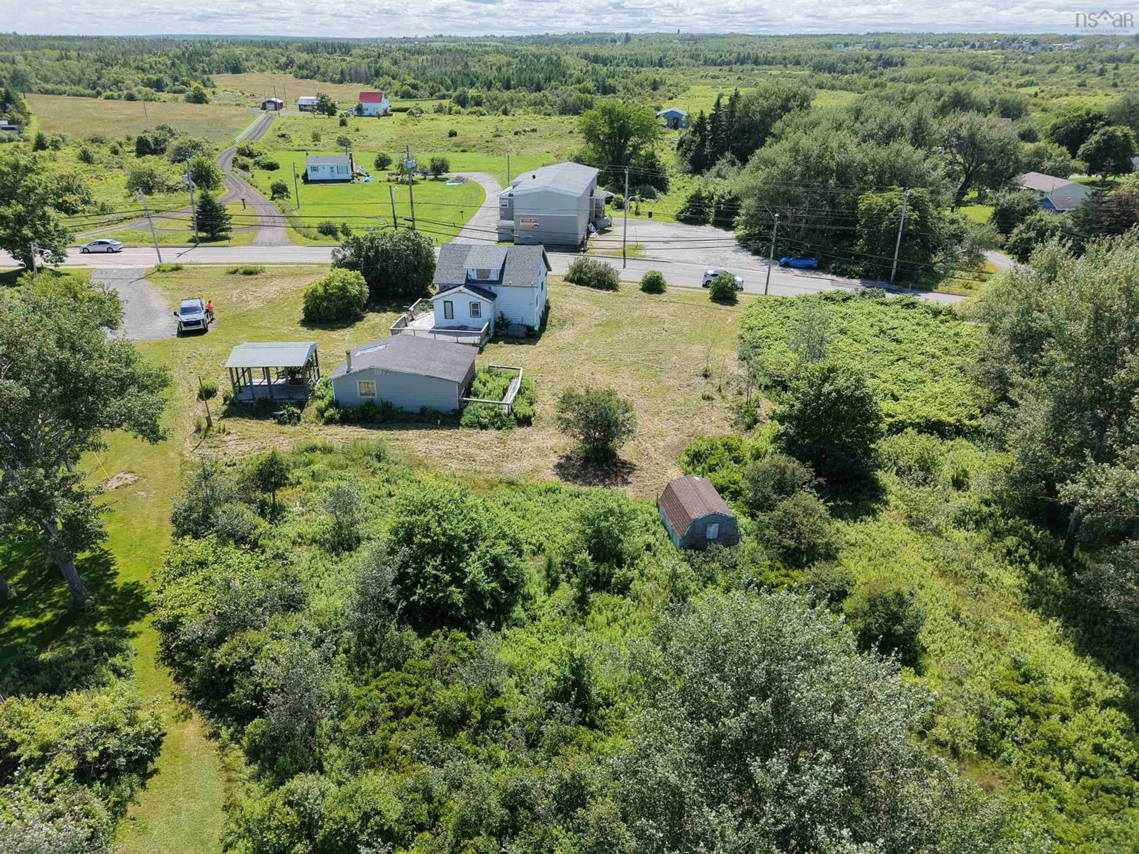 A pic from outside/outdoor area/front of a property/back of a property/a pic from drone, unknown for 1288 Main St, Glace Bay Nova Scotia B1A 5A4