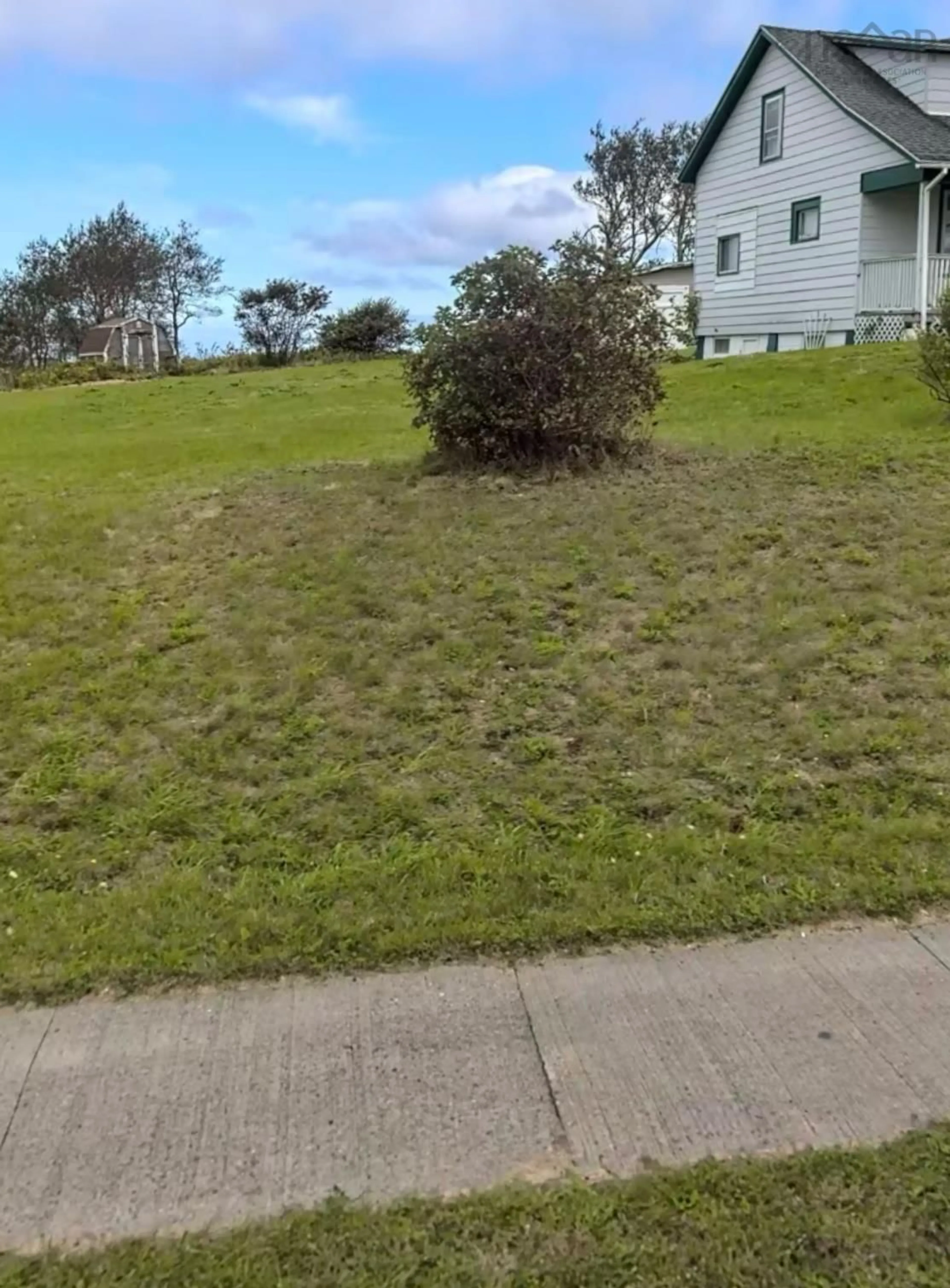 A pic from outside/outdoor area/front of a property/back of a property/a pic from drone, street for 1288 Main St, Glace Bay Nova Scotia B1A 5A4