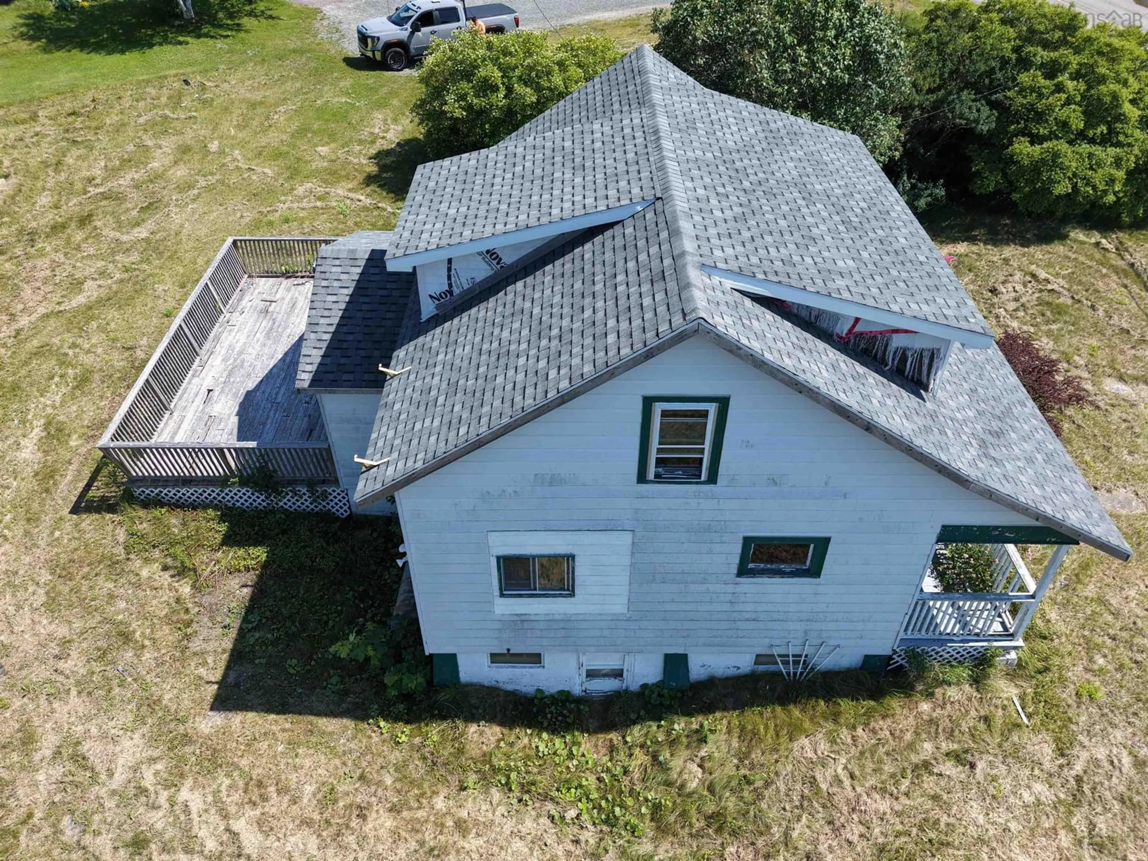 A pic from outside/outdoor area/front of a property/back of a property/a pic from drone, building for 1288 Main St, Glace Bay Nova Scotia B1A 5A4