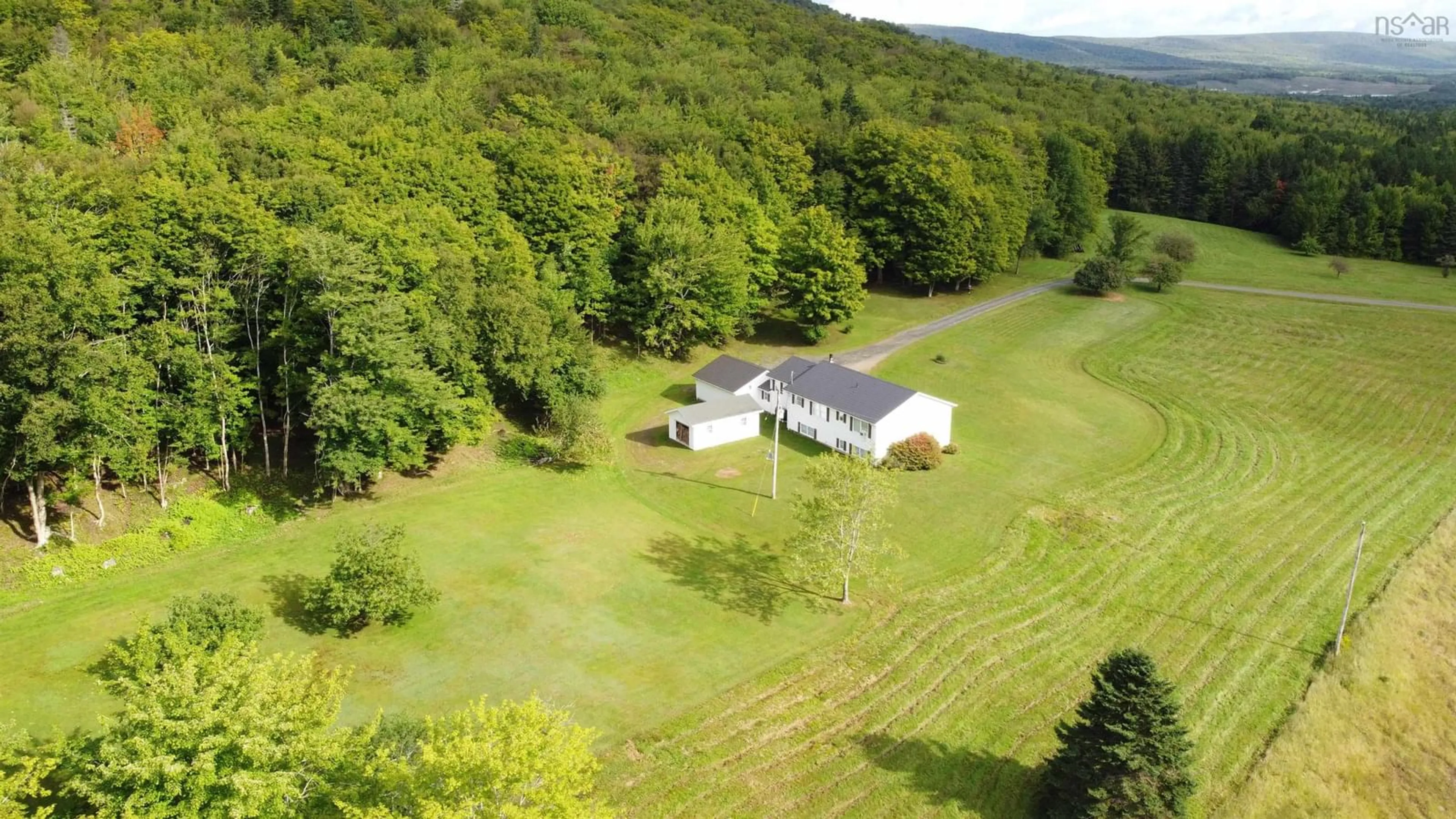 A pic from outside/outdoor area/front of a property/back of a property/a pic from drone, unknown for 5679 Highway 105 Hwy, Melford Nova Scotia B0E 2Y0