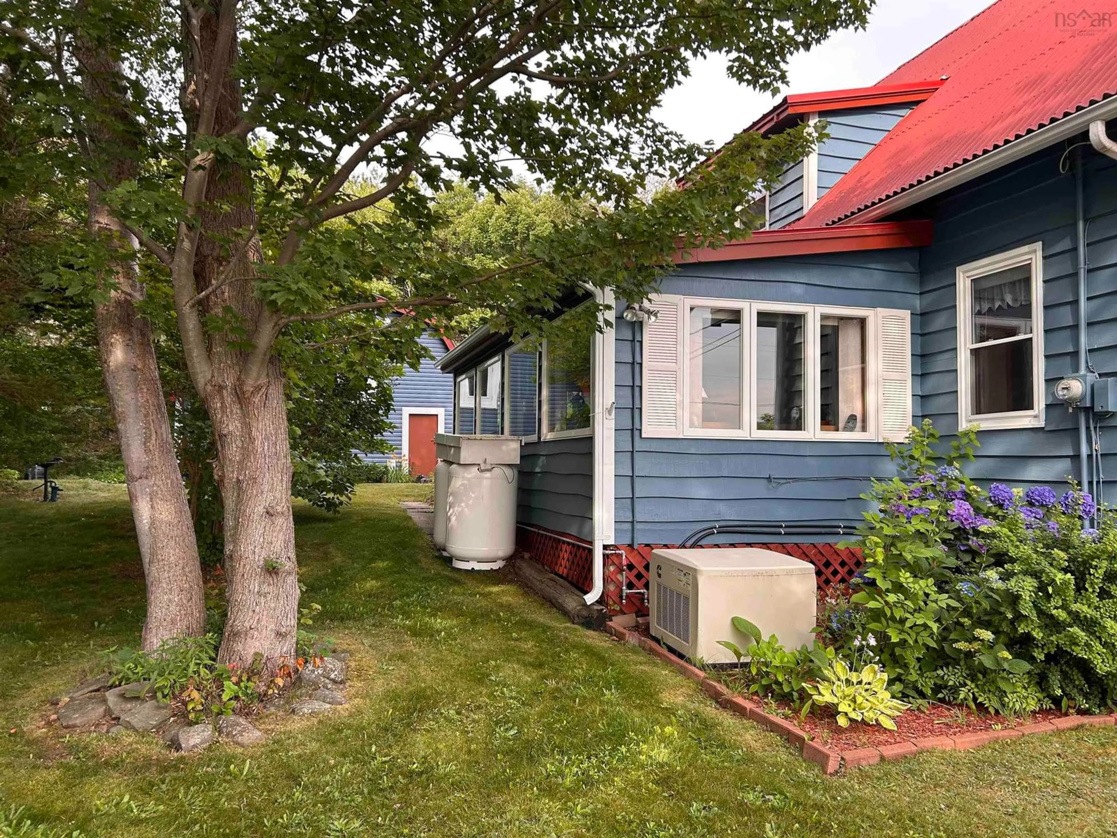 A pic from outside/outdoor area/front of a property/back of a property/a pic from drone, street for 431 Shore Rd, Bay View Nova Scotia B0V 1A0