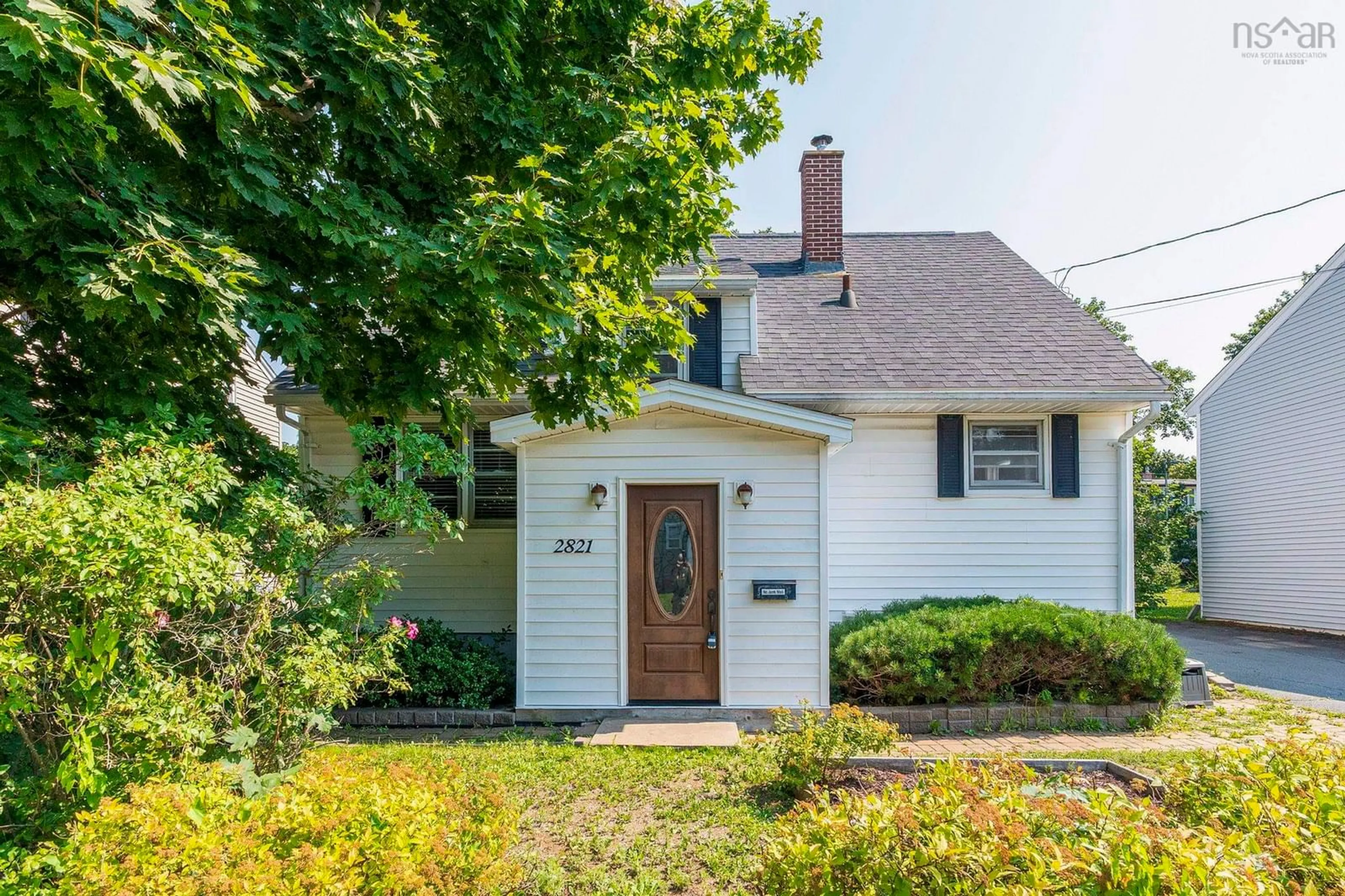 Home with vinyl exterior material, street for 2821 Ralph Devlin Dr, Halifax Nova Scotia B3L 3T2