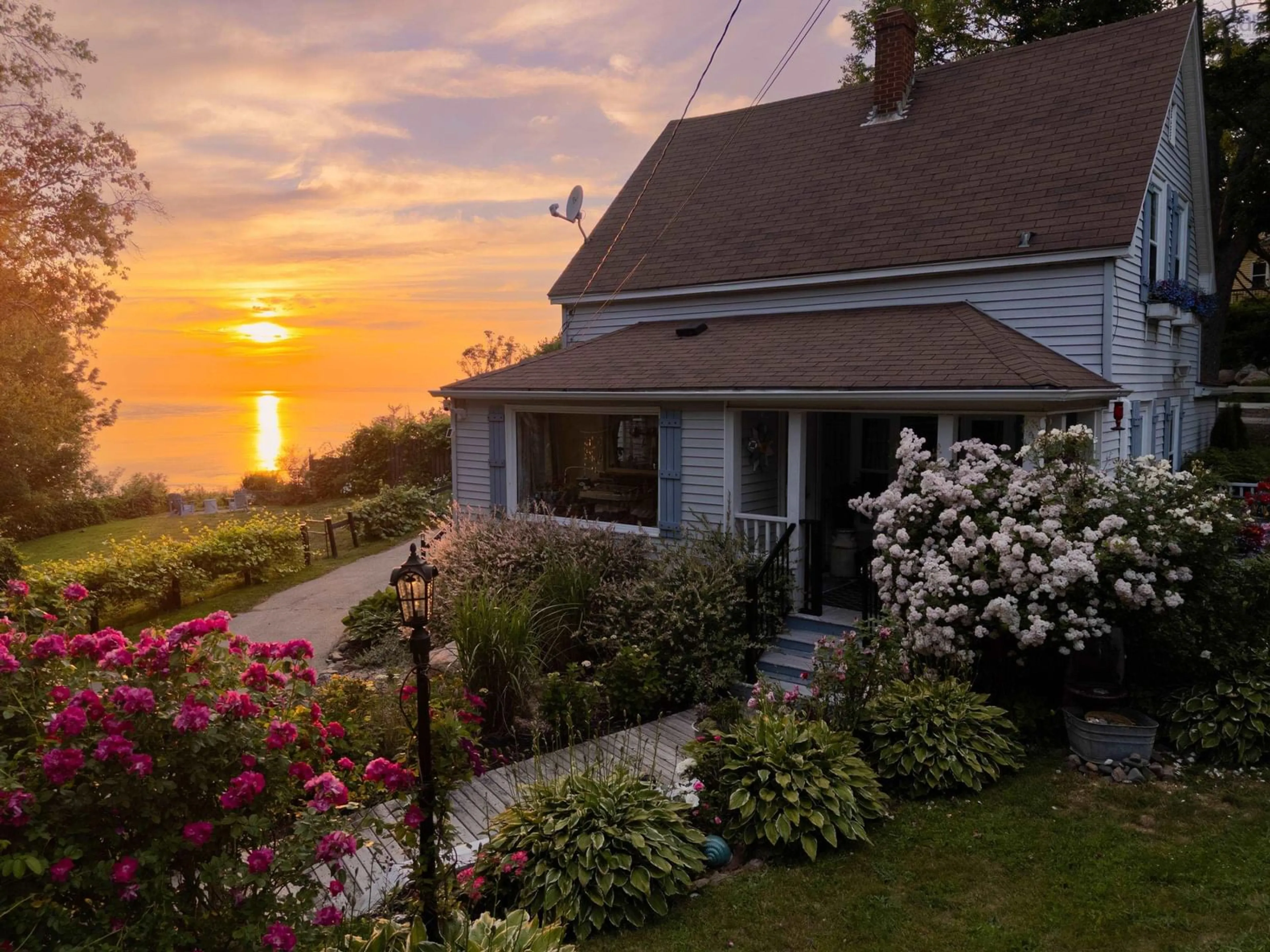 A pic from outside/outdoor area/front of a property/back of a property/a pic from drone, water/lake/river/ocean view for 608 Granville Rd, Victoria Beach Nova Scotia B0S 1A0