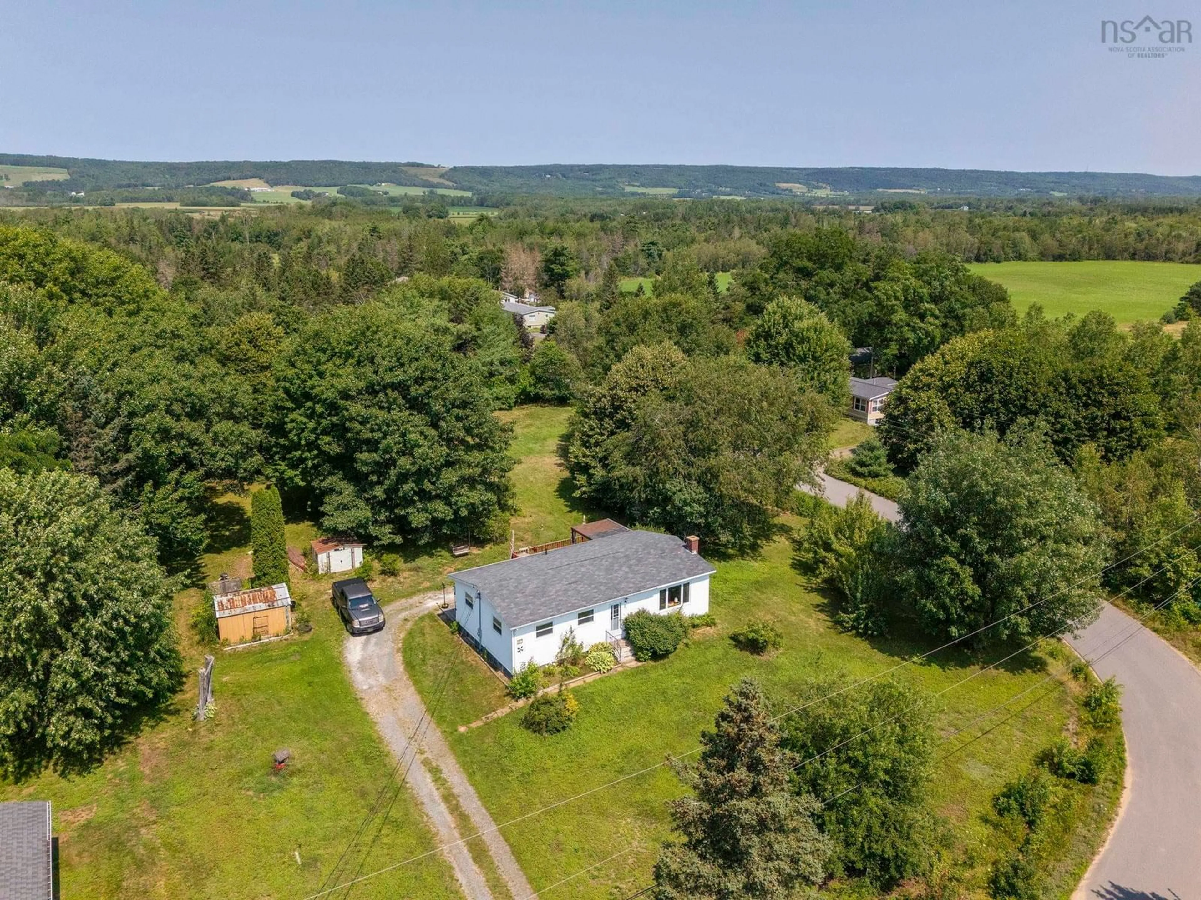 A pic from outside/outdoor area/front of a property/back of a property/a pic from drone, water/lake/river/ocean view for 83 Pineo St, East Kingston Nova Scotia B0P 1R0