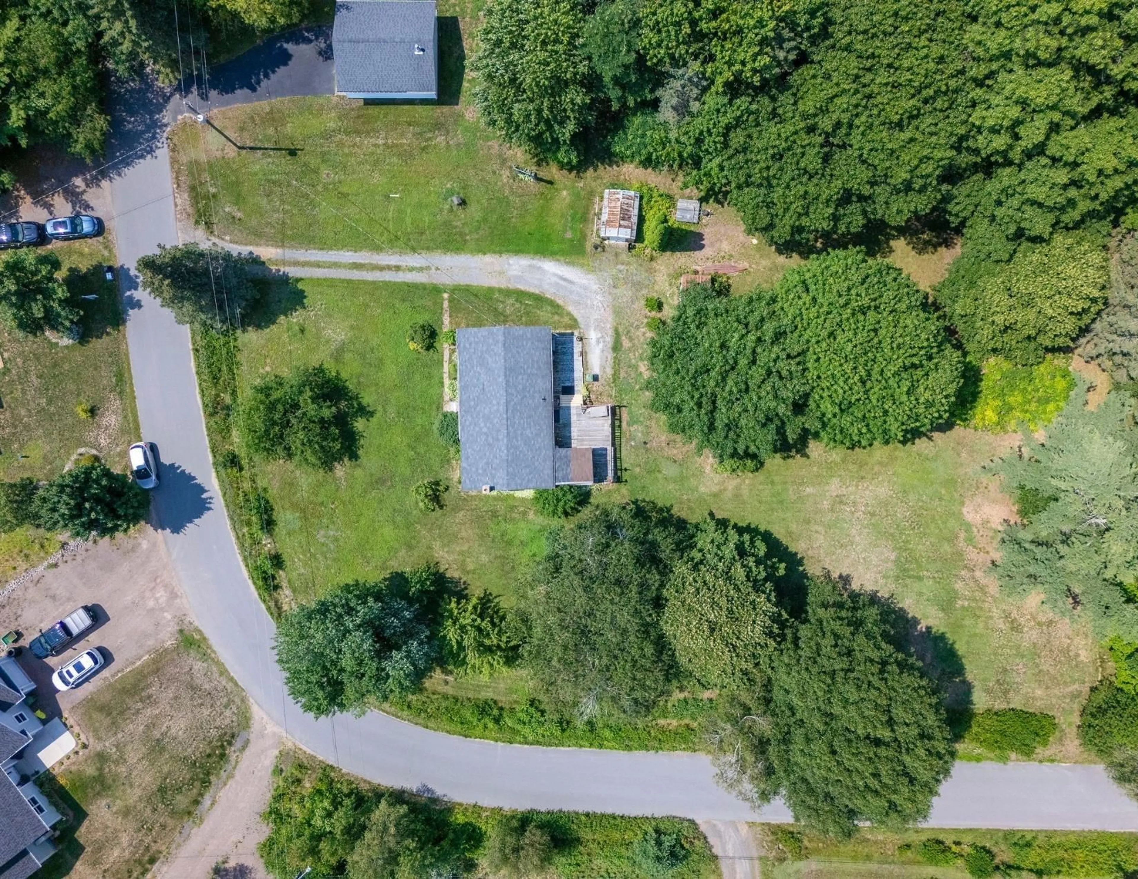 A pic from outside/outdoor area/front of a property/back of a property/a pic from drone, forest/trees view for 83 Pineo St, East Kingston Nova Scotia B0P 1R0