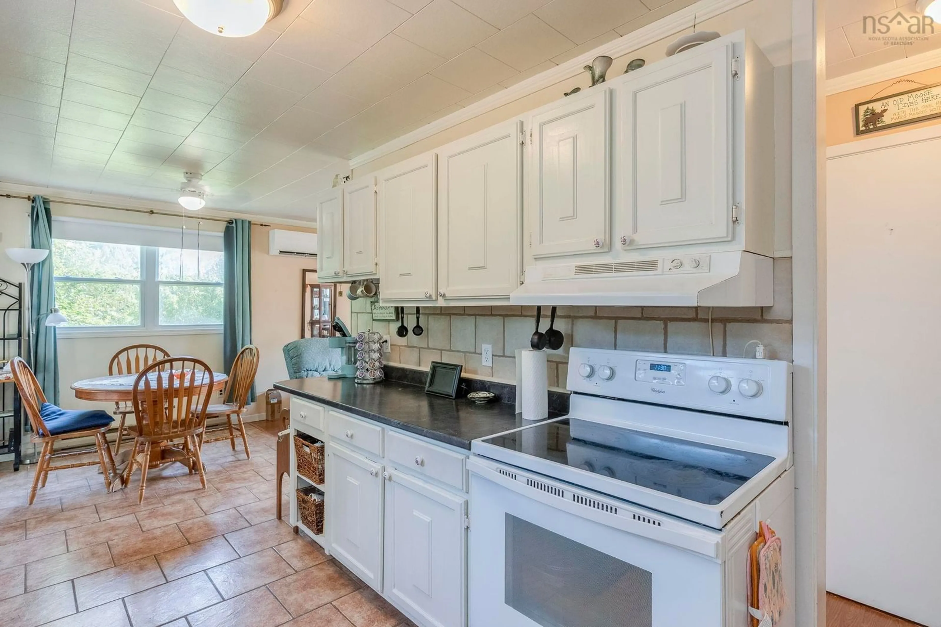 Standard kitchen, ceramic/tile floor for 83 Pineo St, East Kingston Nova Scotia B0P 1R0