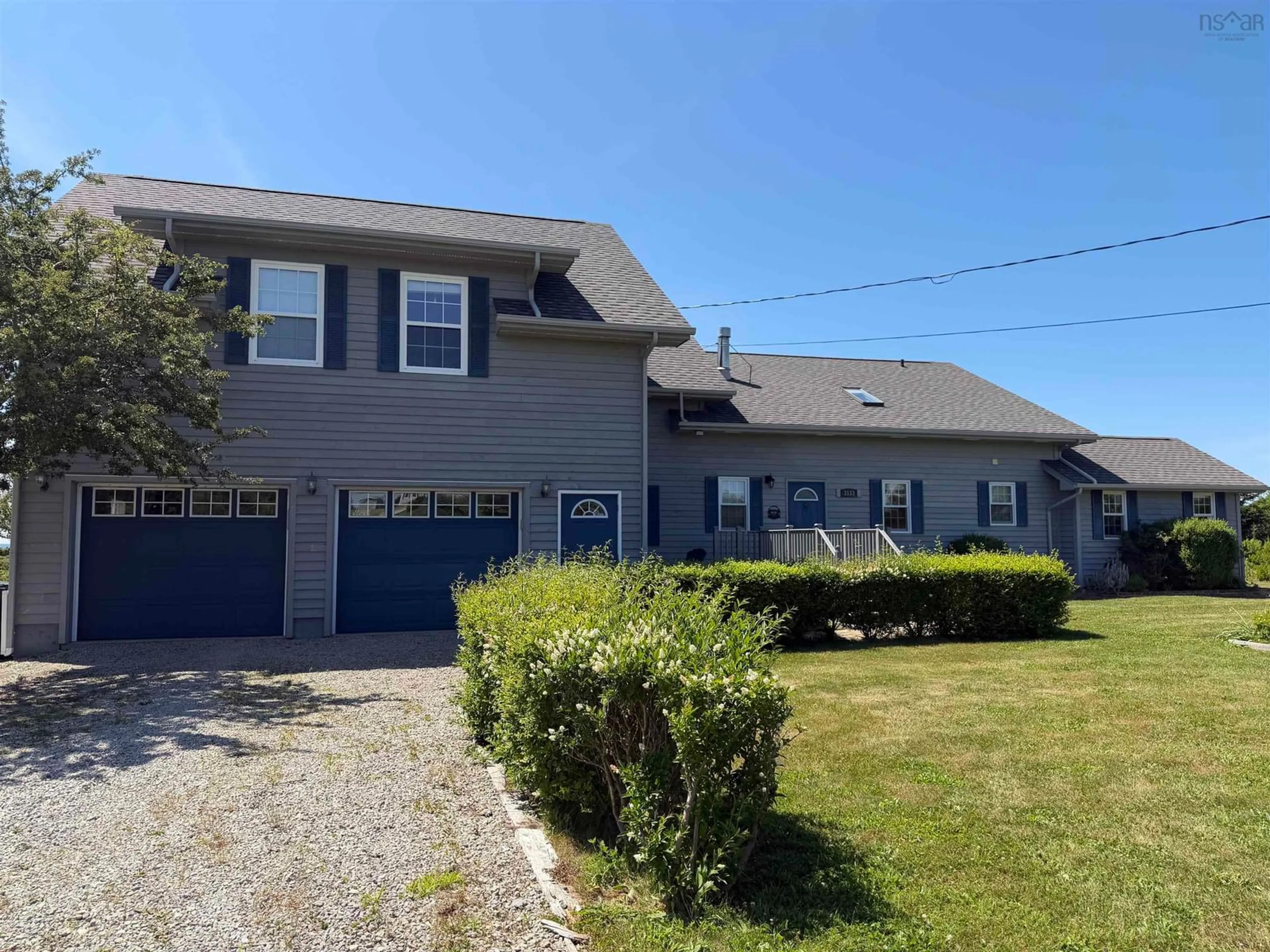 A pic from outside/outdoor area/front of a property/back of a property/a pic from drone, street for 3533 Highway 1, Beaver River Nova Scotia B5A 5A9