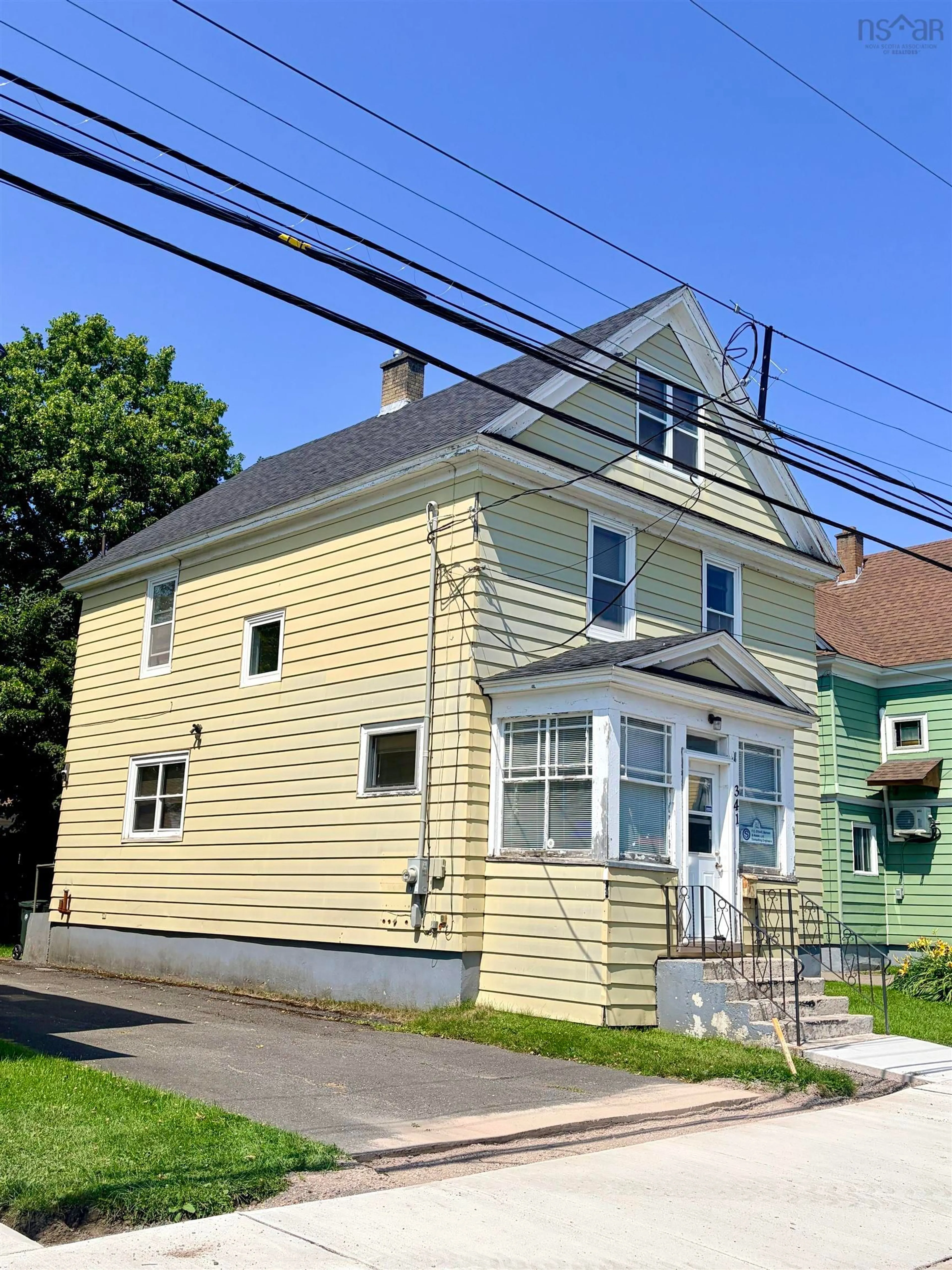 Home with vinyl exterior material, street for 341 Townsend, Sydney Nova Scotia B1P 5G1