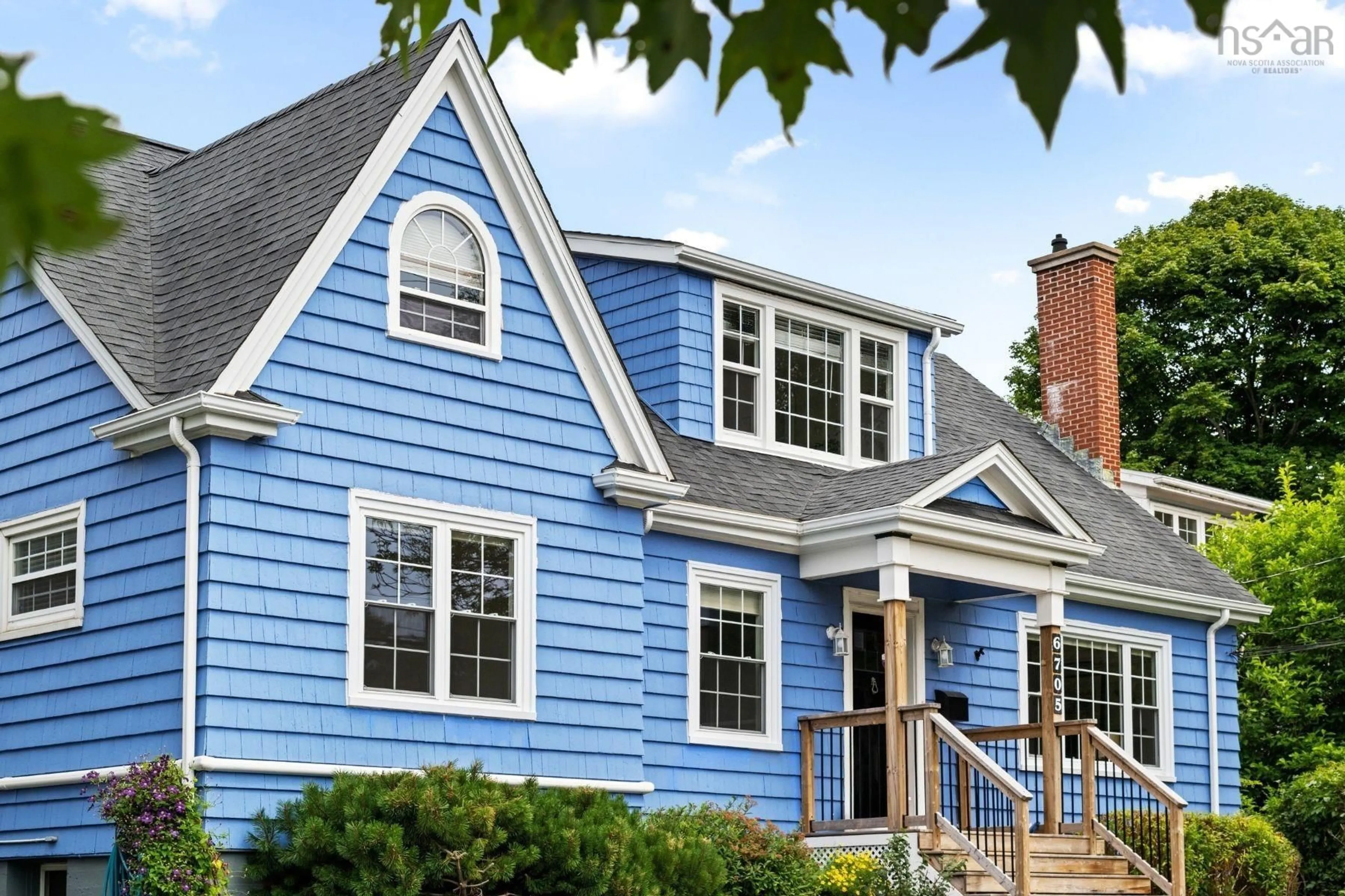 Home with vinyl exterior material, street for 6705 Quinpool Rd, Halifax Nova Scotia B3L 1C1