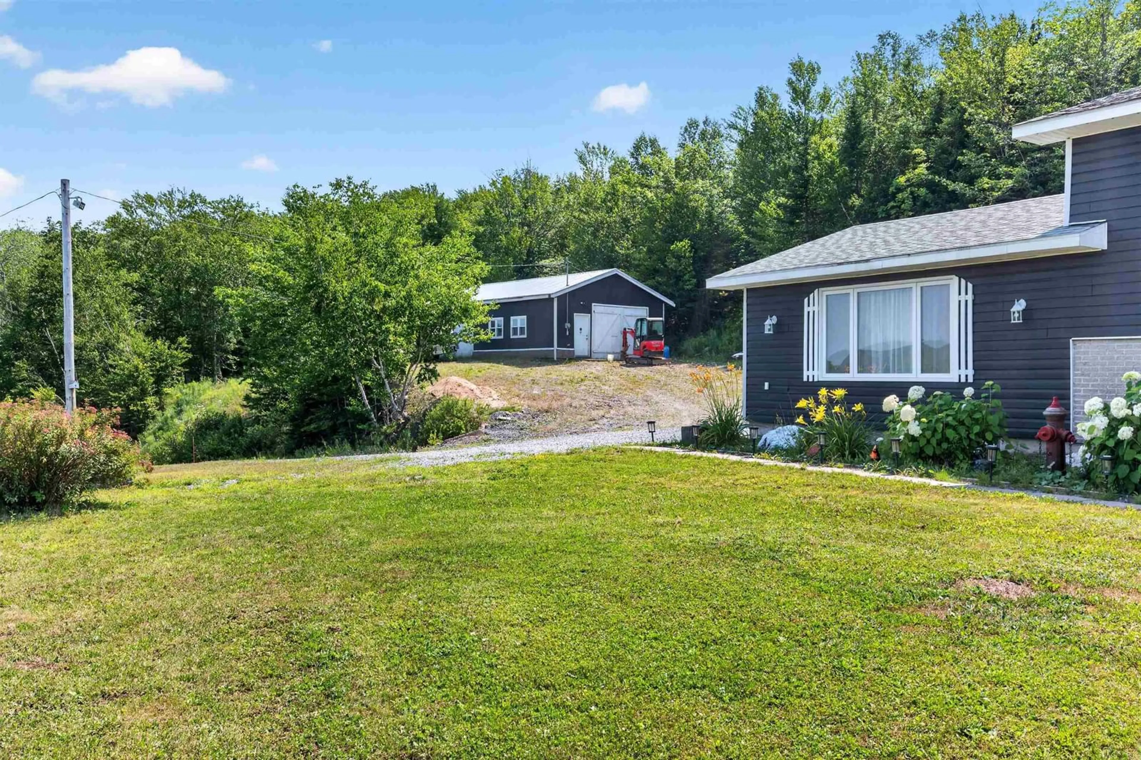 A pic from outside/outdoor area/front of a property/back of a property/a pic from drone, water/lake/river/ocean view for 22163 Highway 7, Sheet Harbour Nova Scotia B0J 3B0