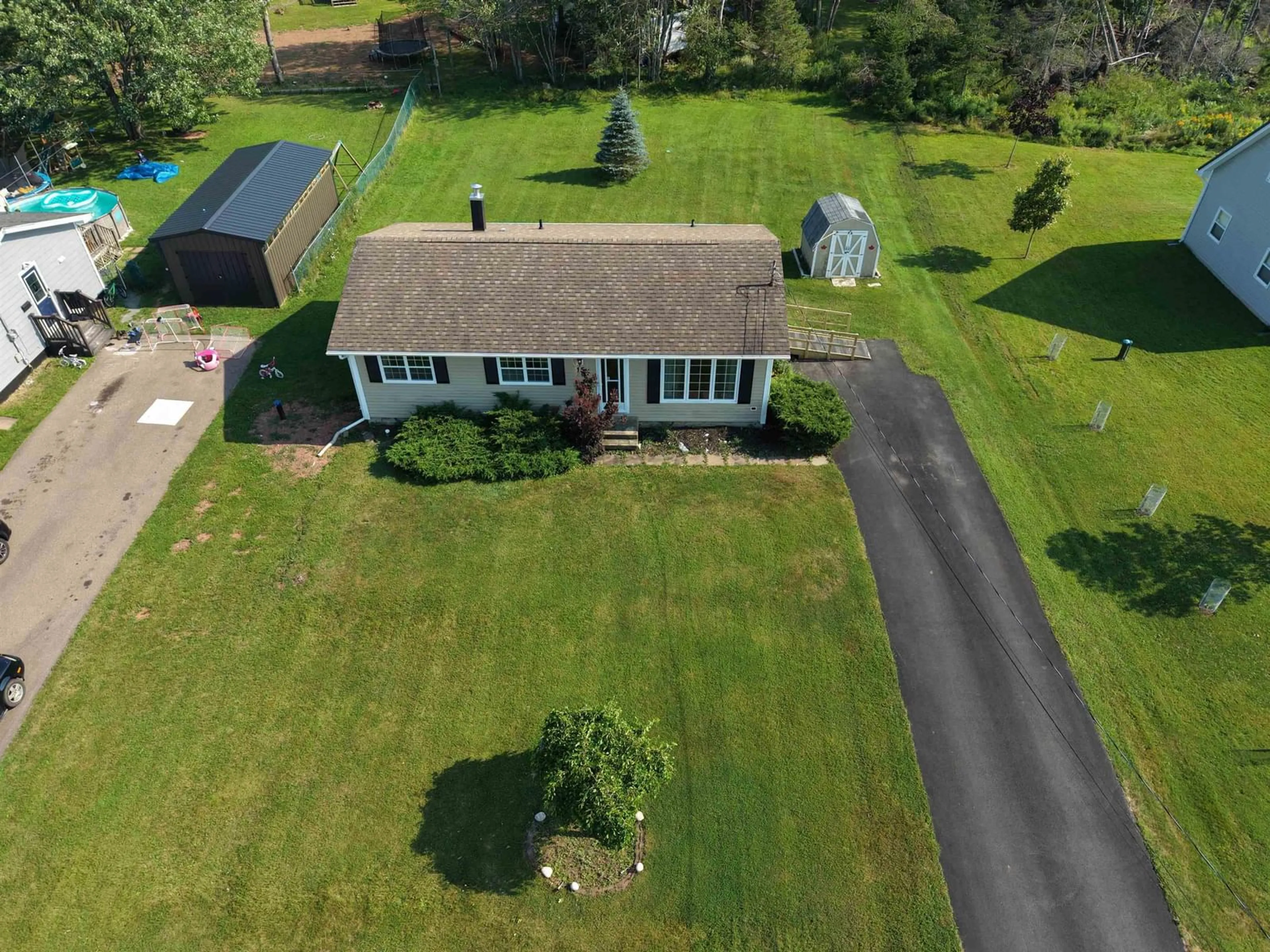A pic from outside/outdoor area/front of a property/back of a property/a pic from drone, unknown for 15 Montery Dr, Salmon River Nova Scotia B2N 5S4