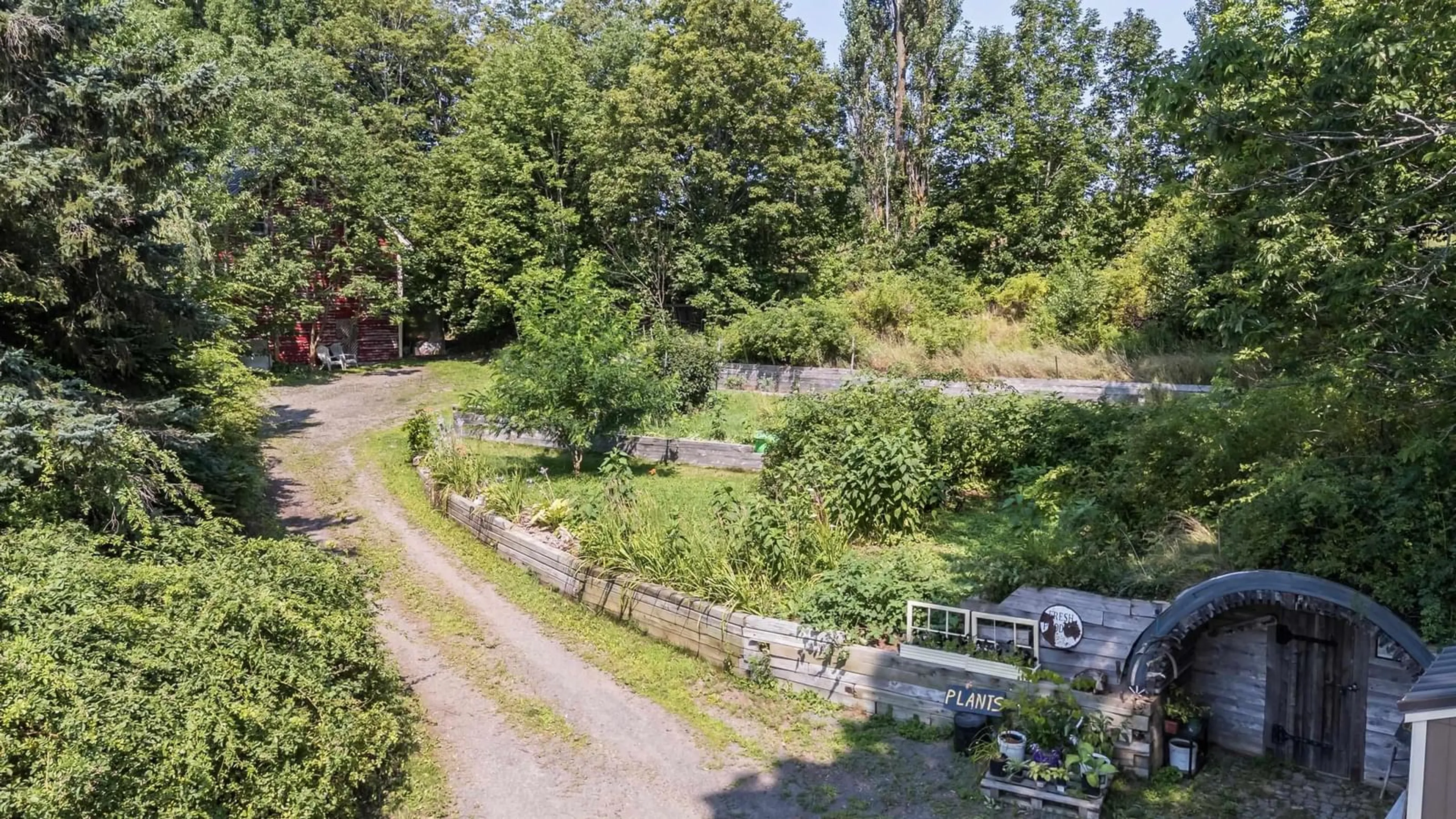 A pic from outside/outdoor area/front of a property/back of a property/a pic from drone, unknown for 11589 Highway 1, Grand Pré Nova Scotia B0P 1M0