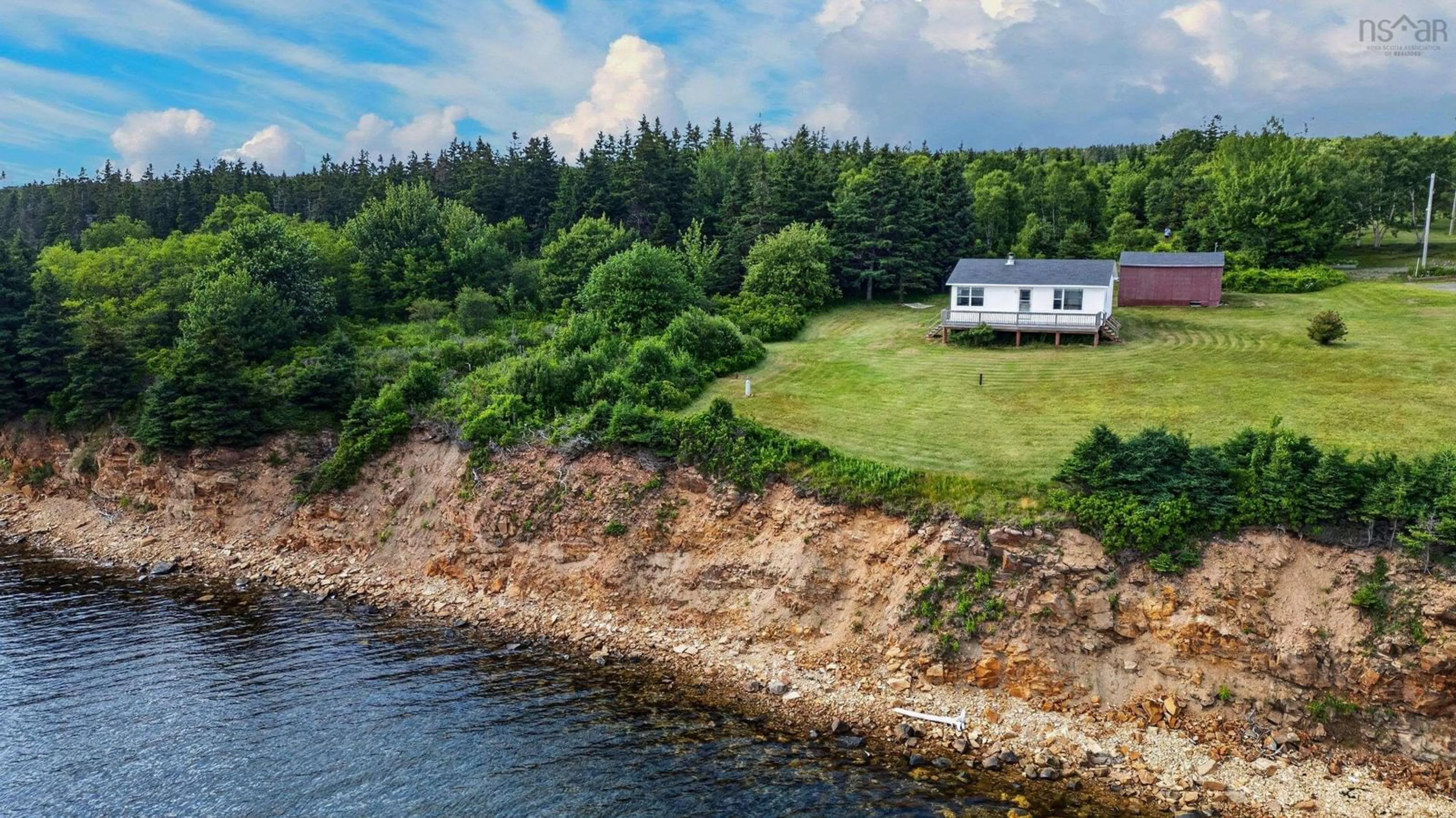 A pic from outside/outdoor area/front of a property/back of a property/a pic from drone, water/lake/river/ocean view for 31 Cambells Lane, Kempt Head Nova Scotia B1X 1Z4