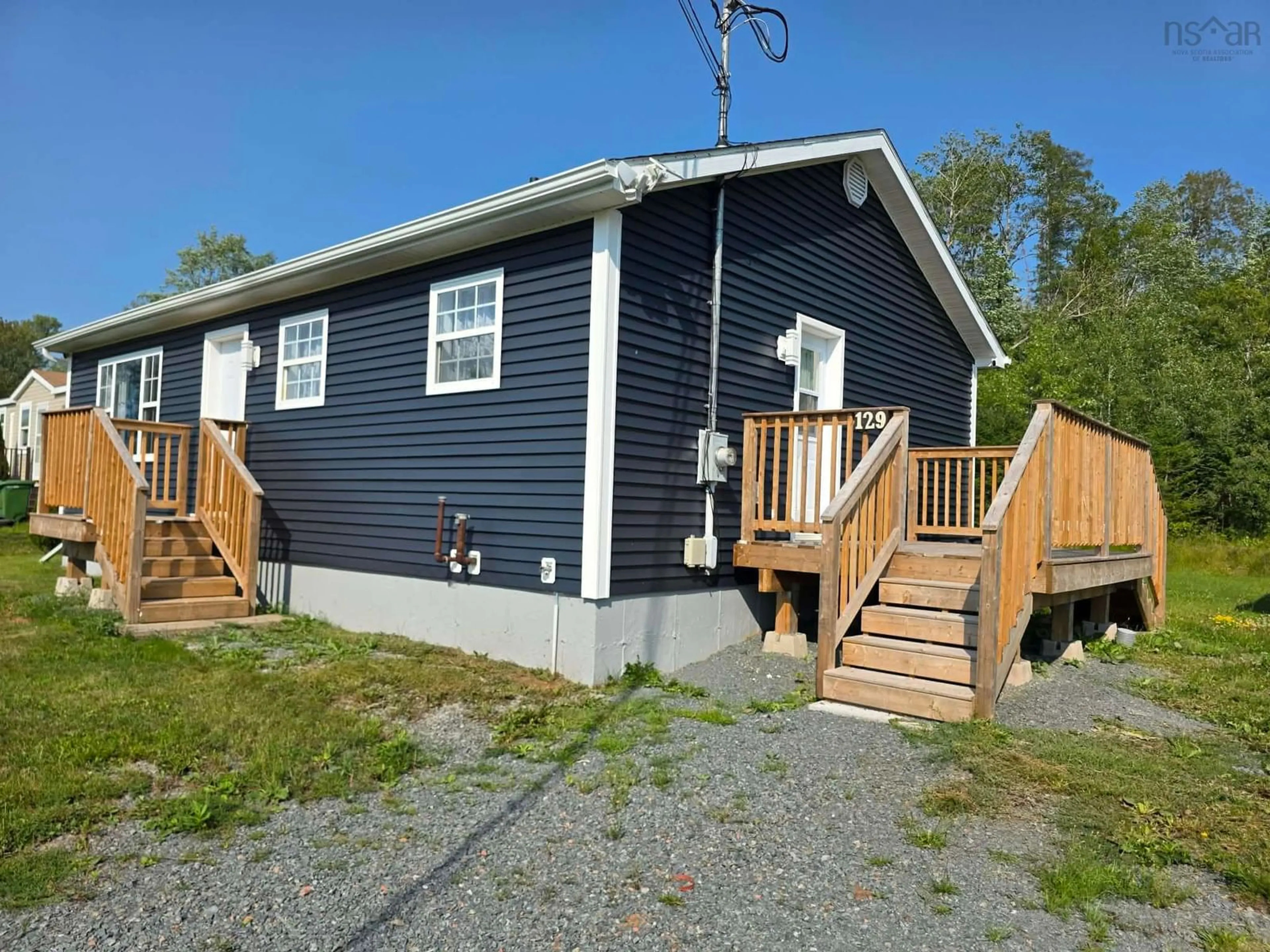 Home with vinyl exterior material, street for Jeffery Lambert #129, Hilden Nova Scotia B0N 1C0