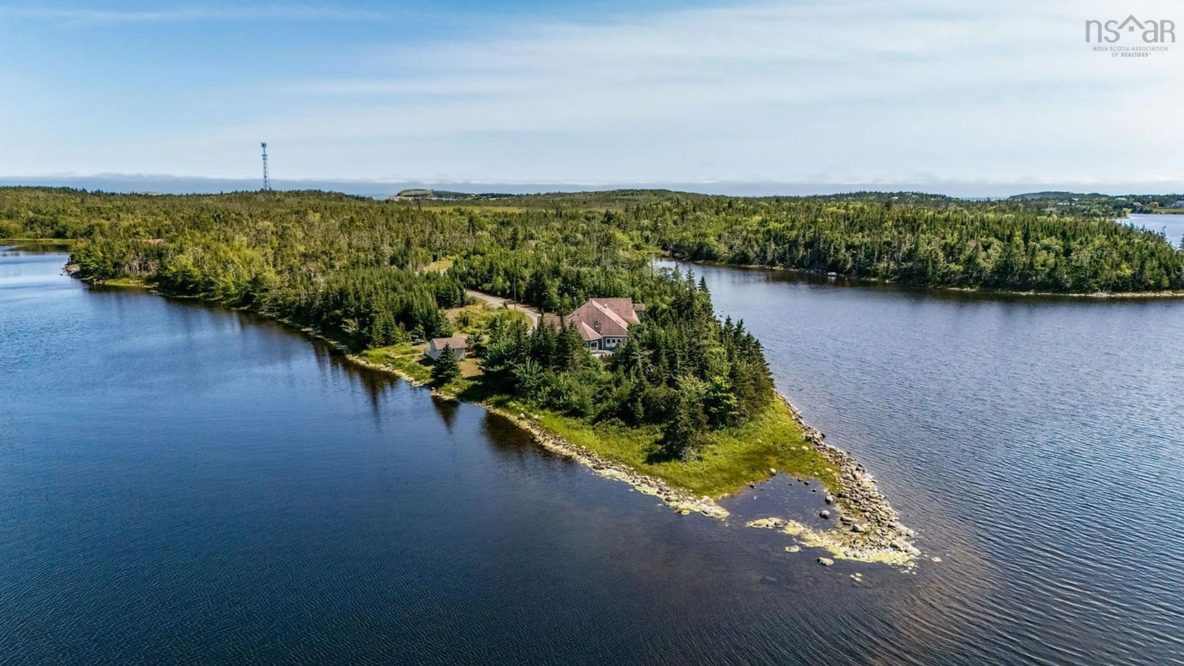 A pic from outside/outdoor area/front of a property/back of a property/a pic from drone, water/lake/river/ocean view for 5145 207 Hwy, Three Fathom Harbour Nova Scotia B0L 2L0