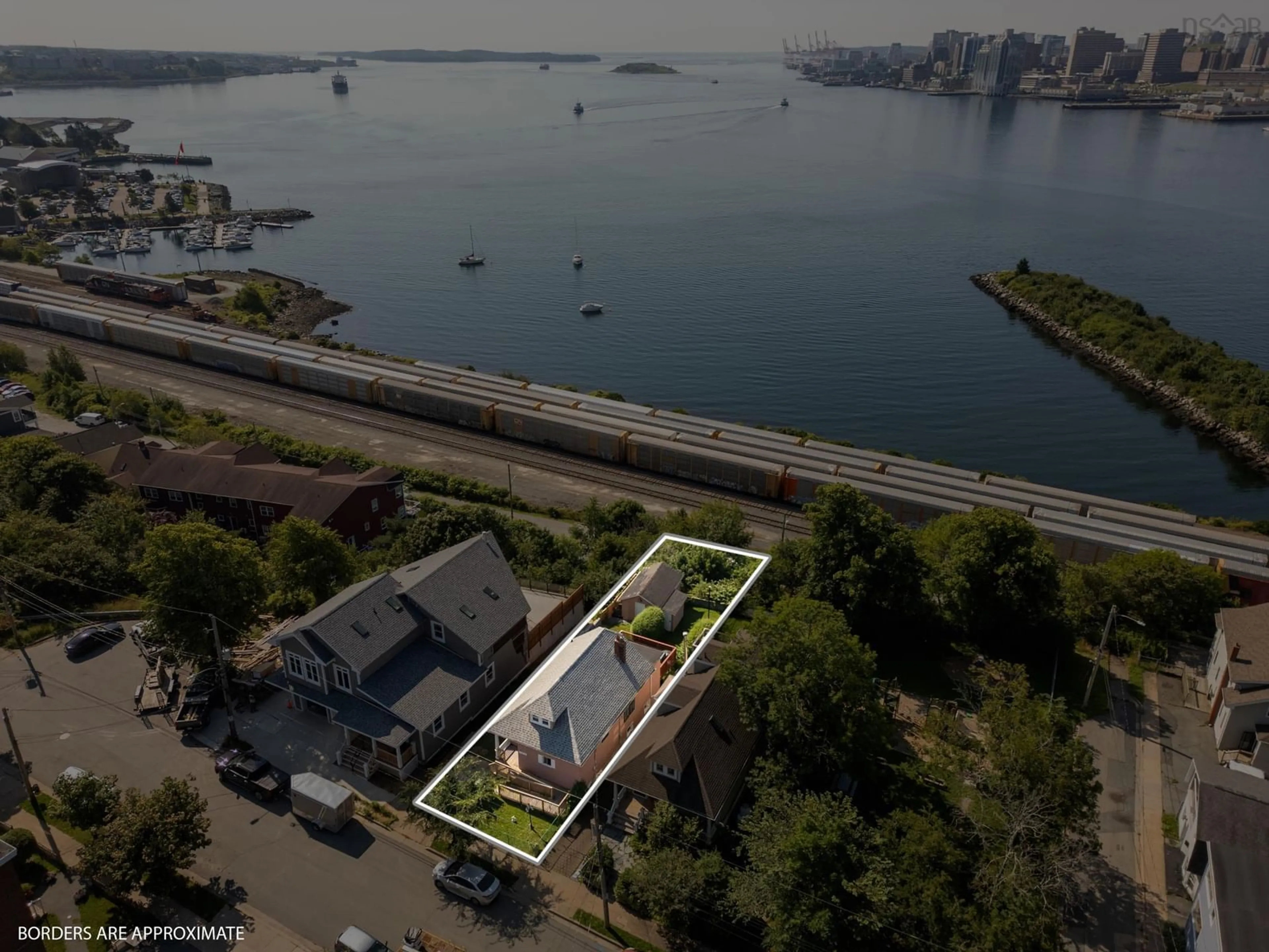 A pic from outside/outdoor area/front of a property/back of a property/a pic from drone, water/lake/river/ocean view for 13 Fairbanks St, Dartmouth Nova Scotia B3A 1B8