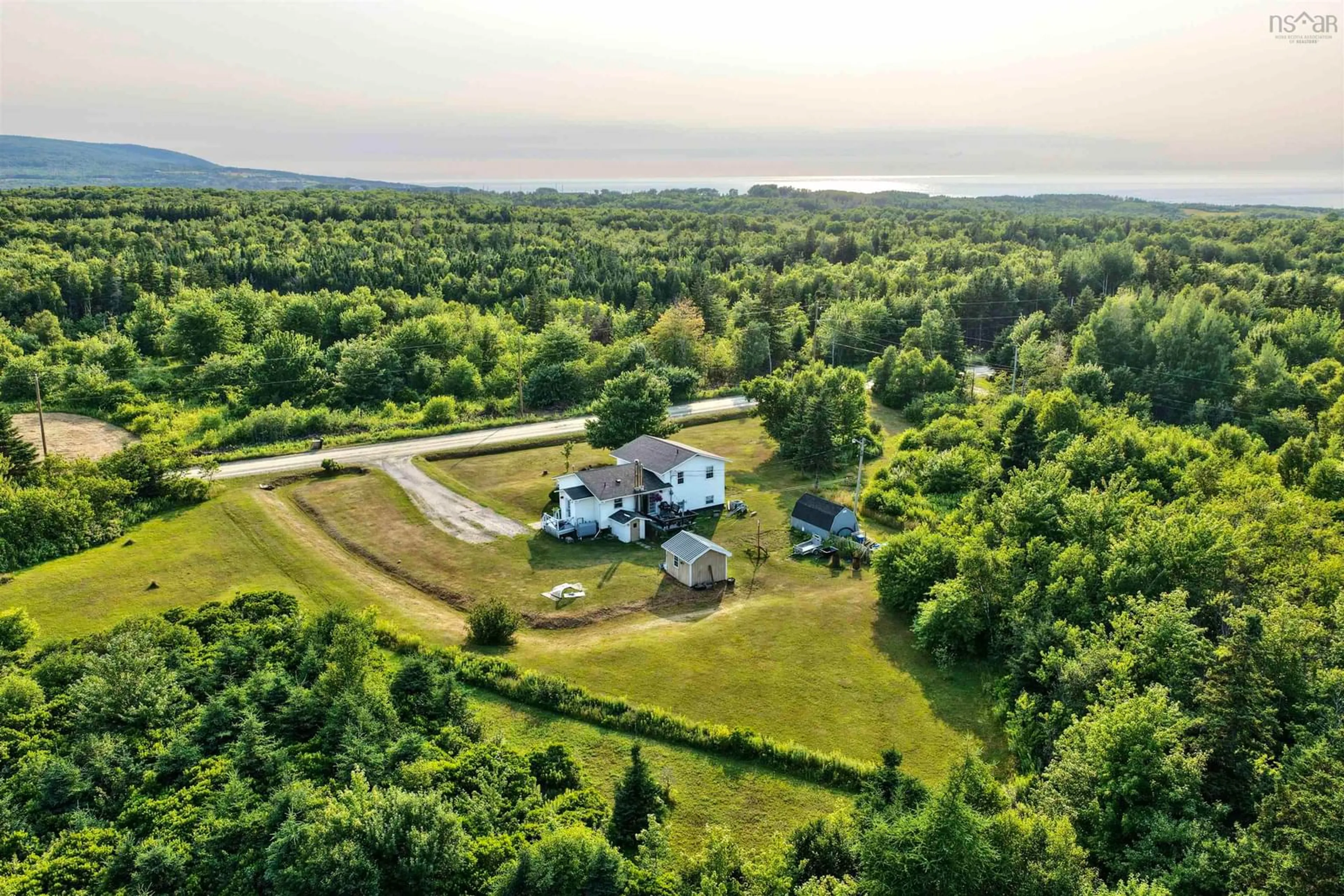A pic from outside/outdoor area/front of a property/back of a property/a pic from drone, water/lake/river/ocean view for 121 Pipers Lane, Inverside Nova Scotia B0E 1N0