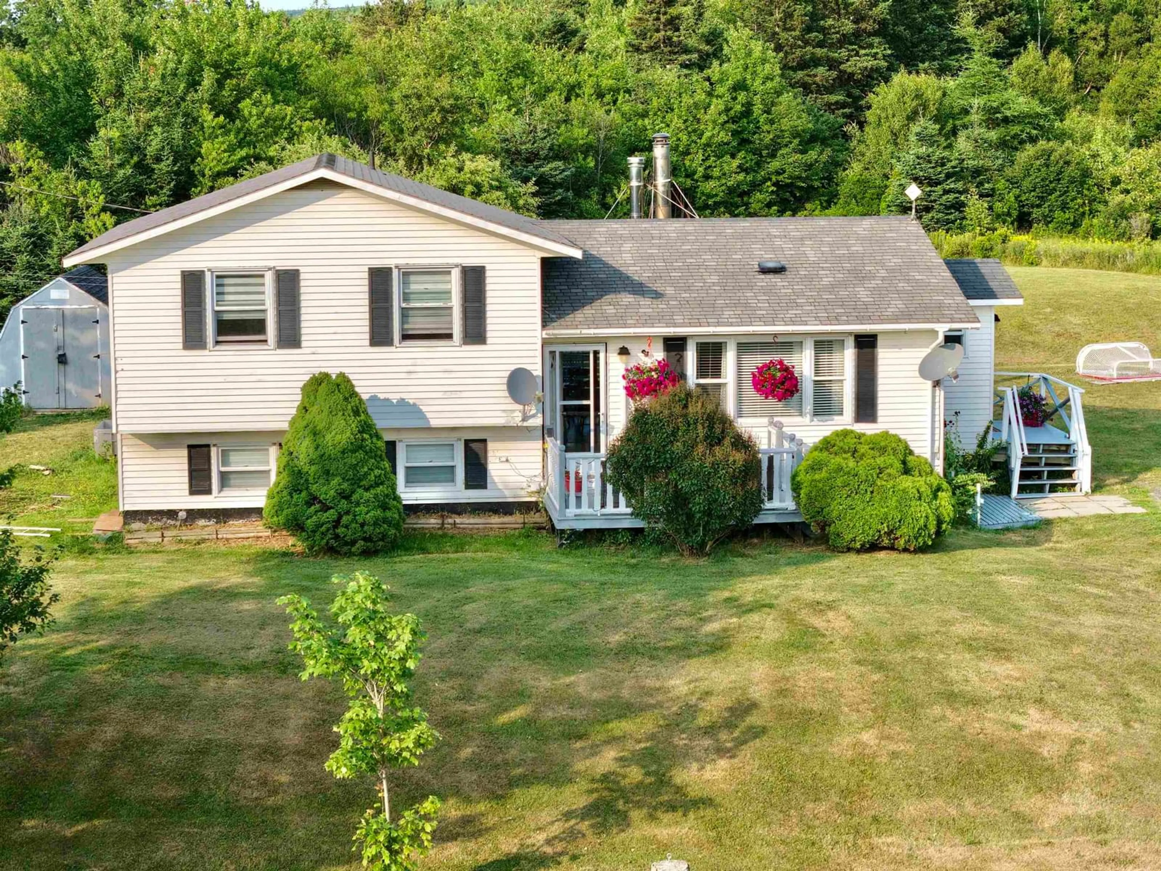 Home with vinyl exterior material, street for 121 Pipers Lane, Inverside Nova Scotia B0E 1N0