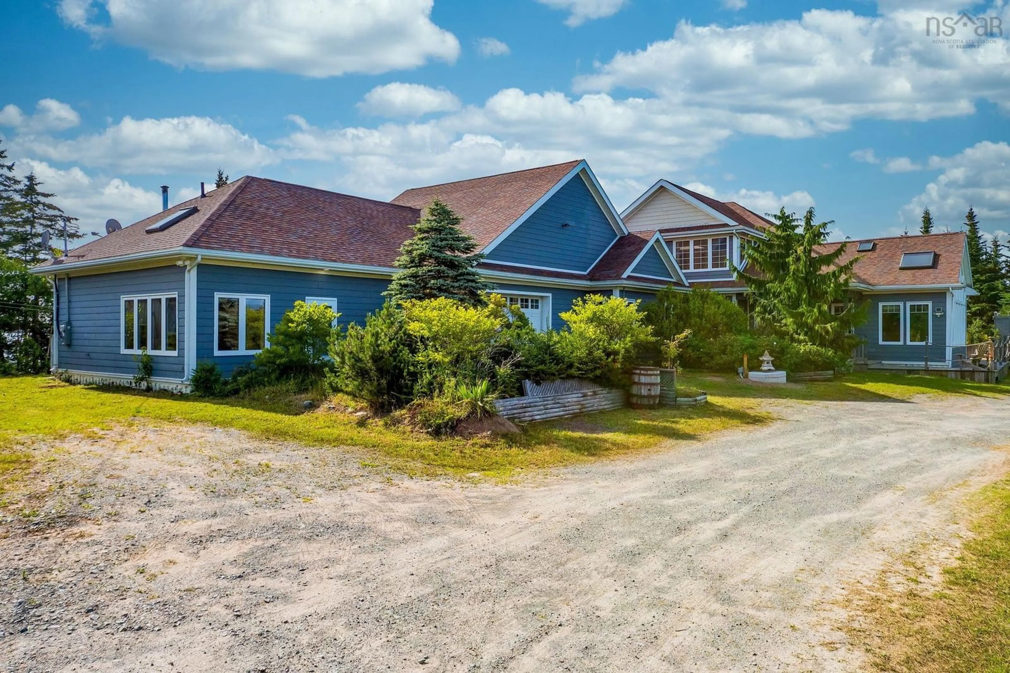 A pic from outside/outdoor area/front of a property/back of a property/a pic from drone, street for 5145 207 Hwy, Three Fathom Harbour Nova Scotia B0J 2L0
