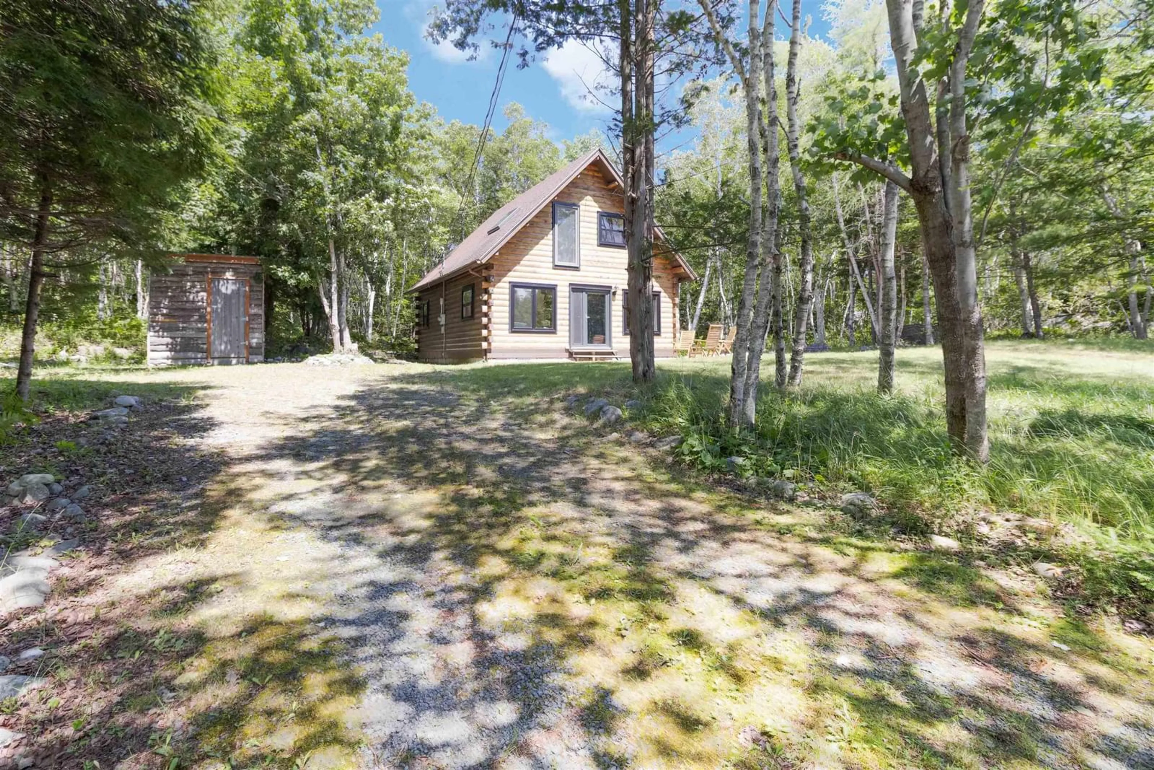 A pic from outside/outdoor area/front of a property/back of a property/a pic from drone, forest/trees view for 236 Five Rivers Dr, White Point Nova Scotia B0T 1G0