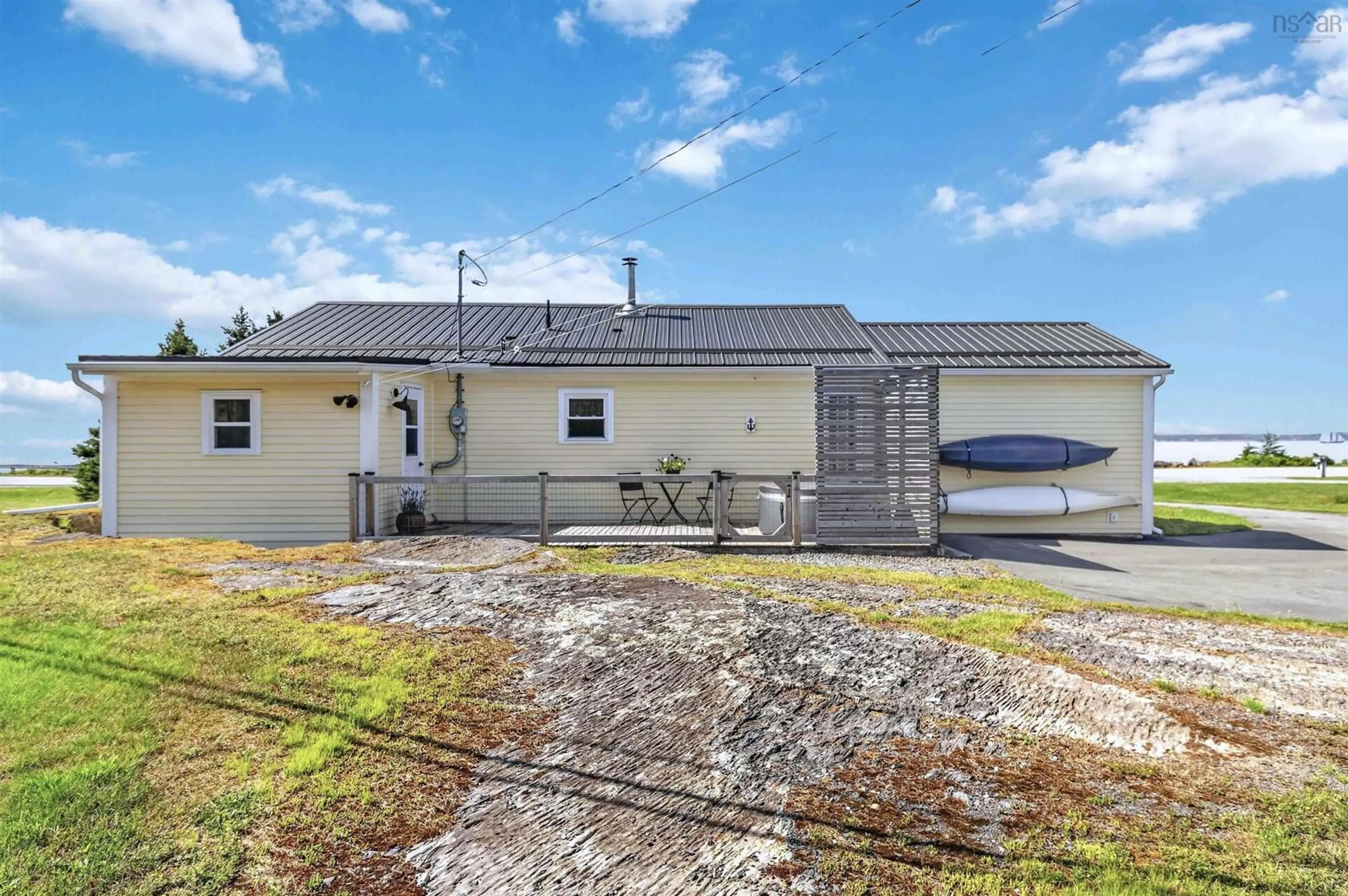 A pic from outside/outdoor area/front of a property/back of a property/a pic from drone, street for 1263 Blue Rocks Rd, Blue Rocks Nova Scotia B0J 2C0