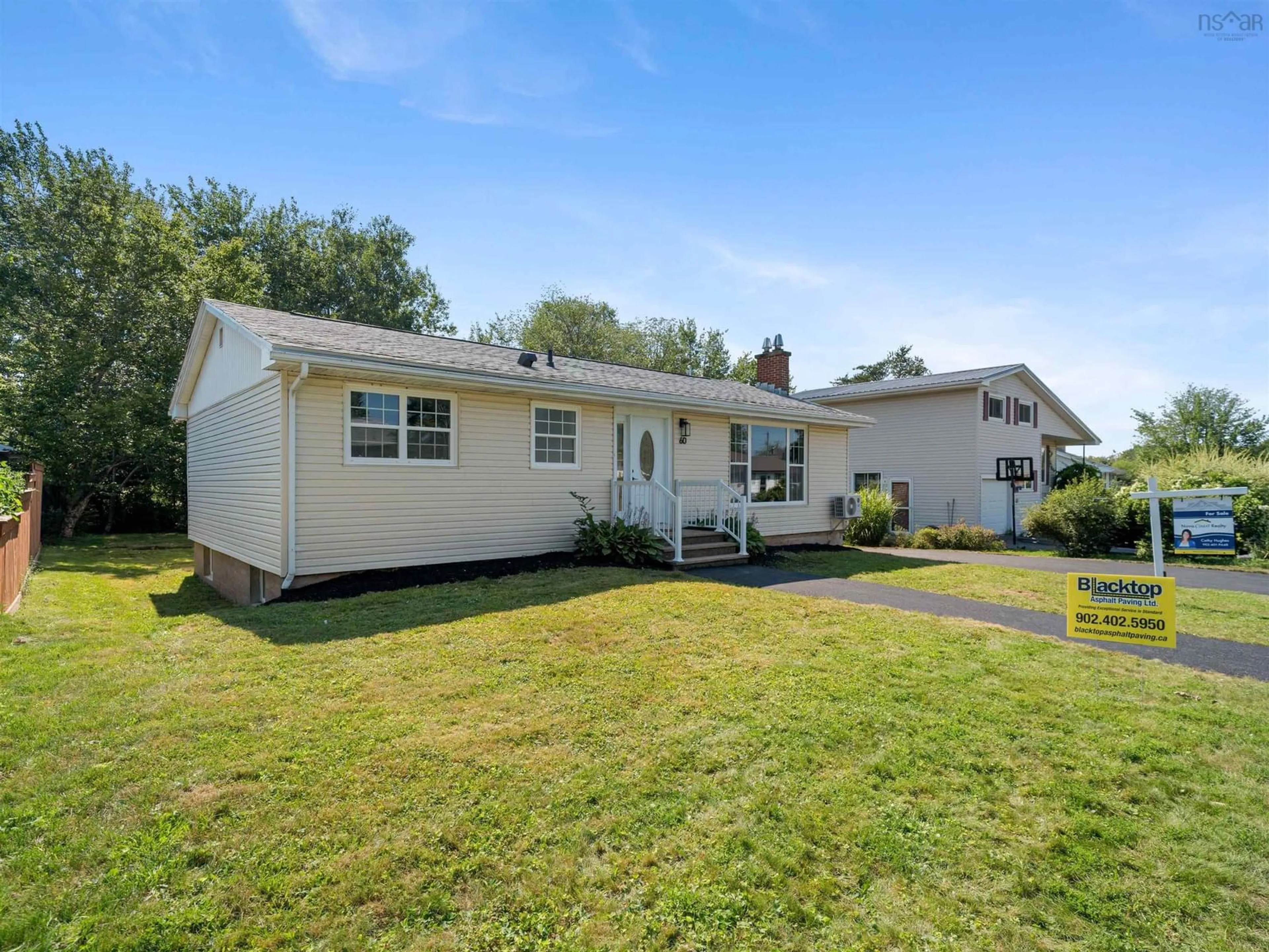 Home with vinyl exterior material, street for 60 Wilmot St, Lower Sackville Nova Scotia B4C 2A8