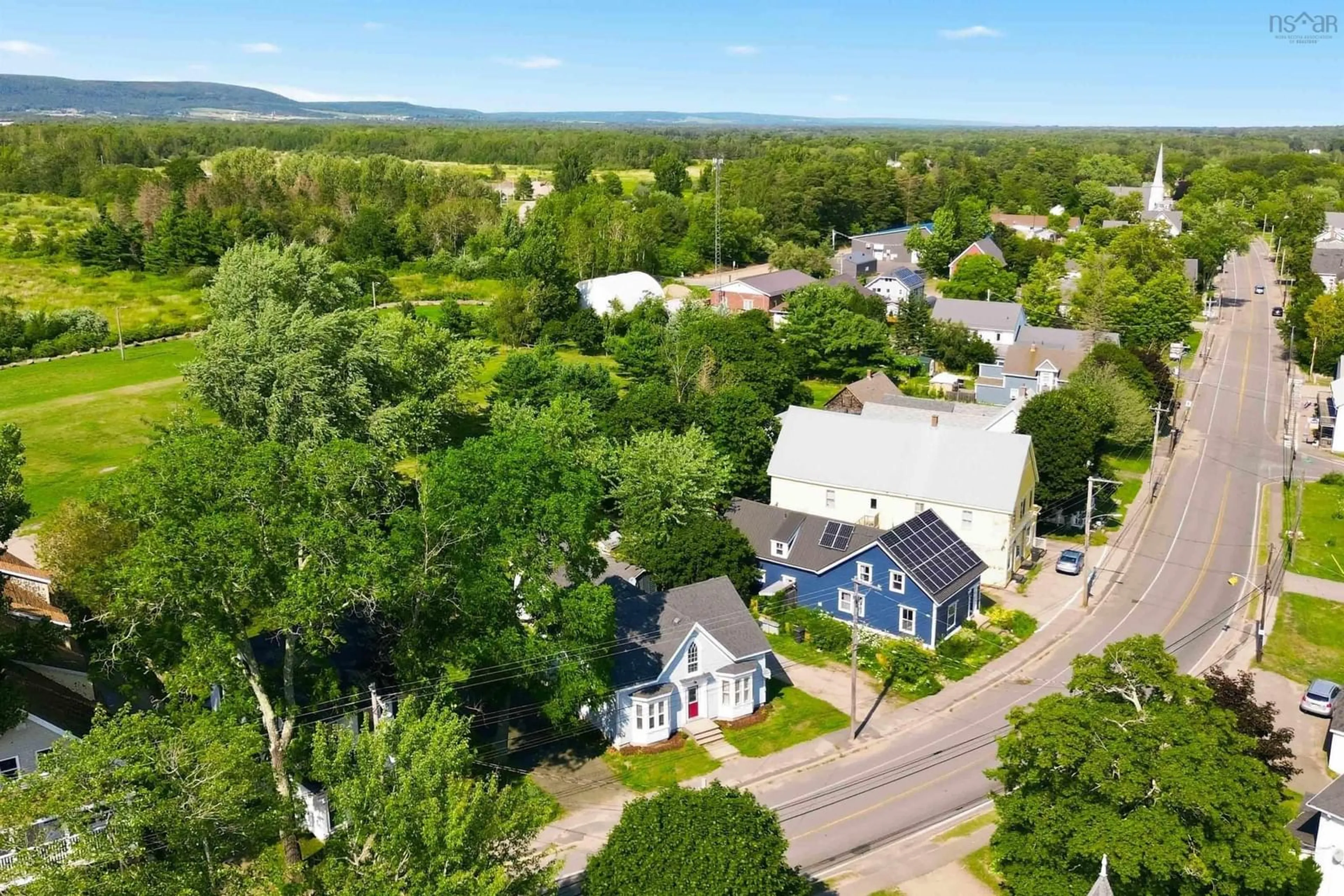A pic from outside/outdoor area/front of a property/back of a property/a pic from drone, mountain view for 525 Main St, Lawrencetown Nova Scotia B0S 1M0