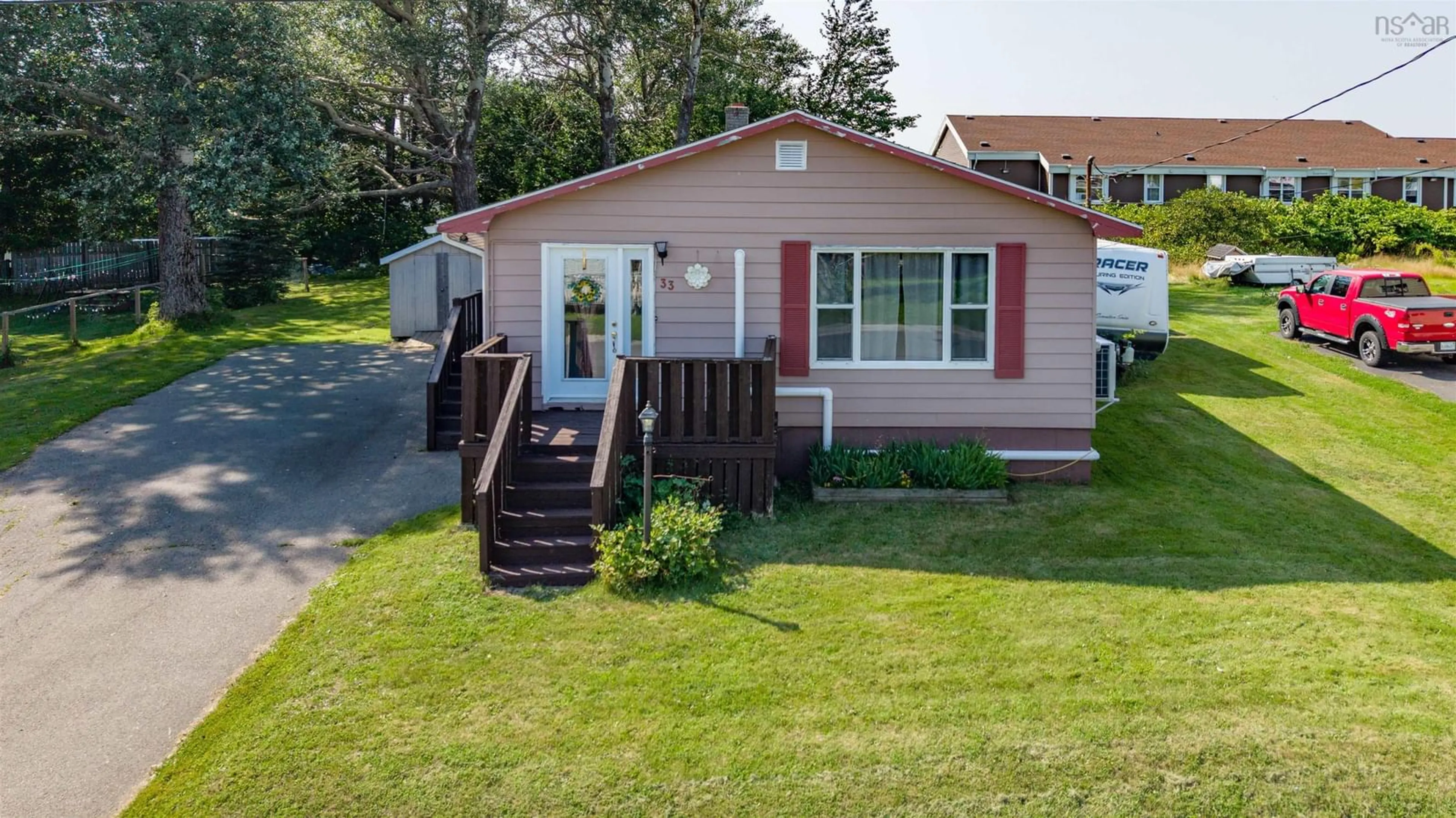A pic from outside/outdoor area/front of a property/back of a property/a pic from drone, street for 33 Convent St, Sydney Mines Nova Scotia B1V 1J8