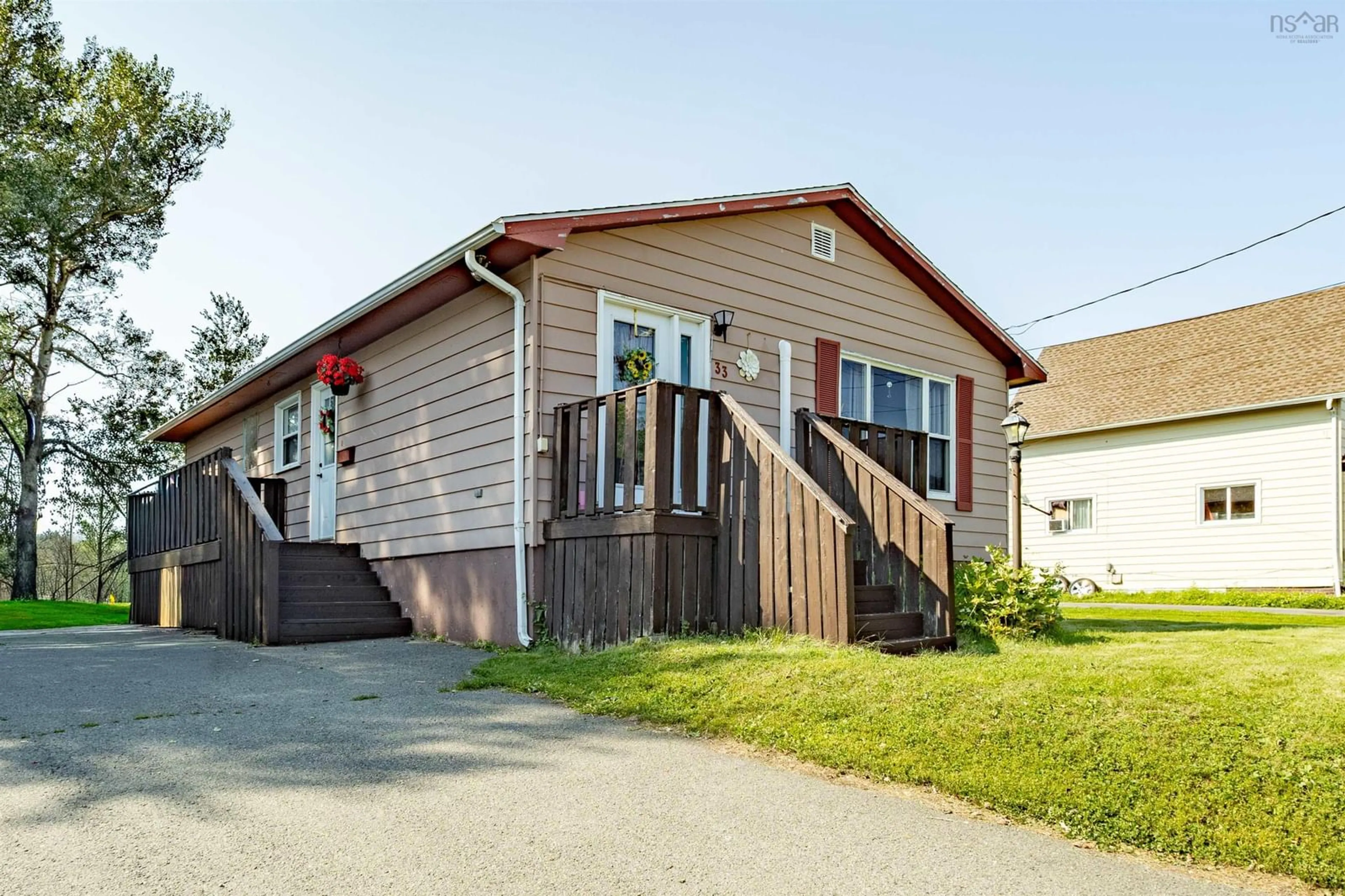 Home with vinyl exterior material, street for 33 Convent St, Sydney Mines Nova Scotia B1V 1J8