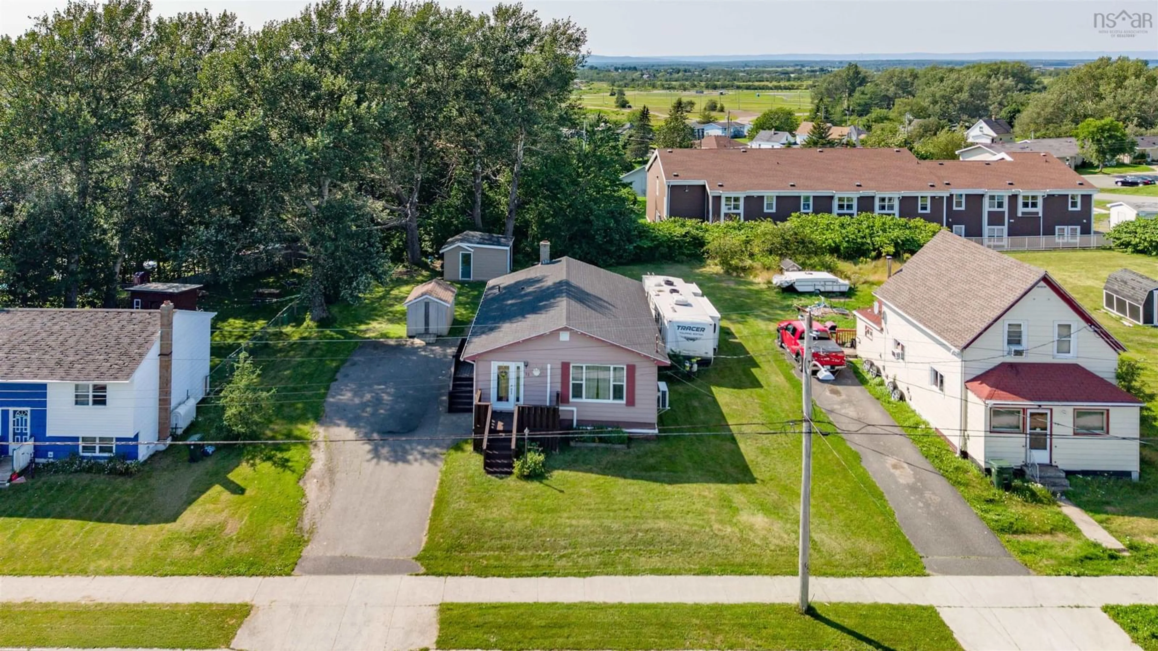 A pic from outside/outdoor area/front of a property/back of a property/a pic from drone, street for 33 Convent St, Sydney Mines Nova Scotia B1V 1J8