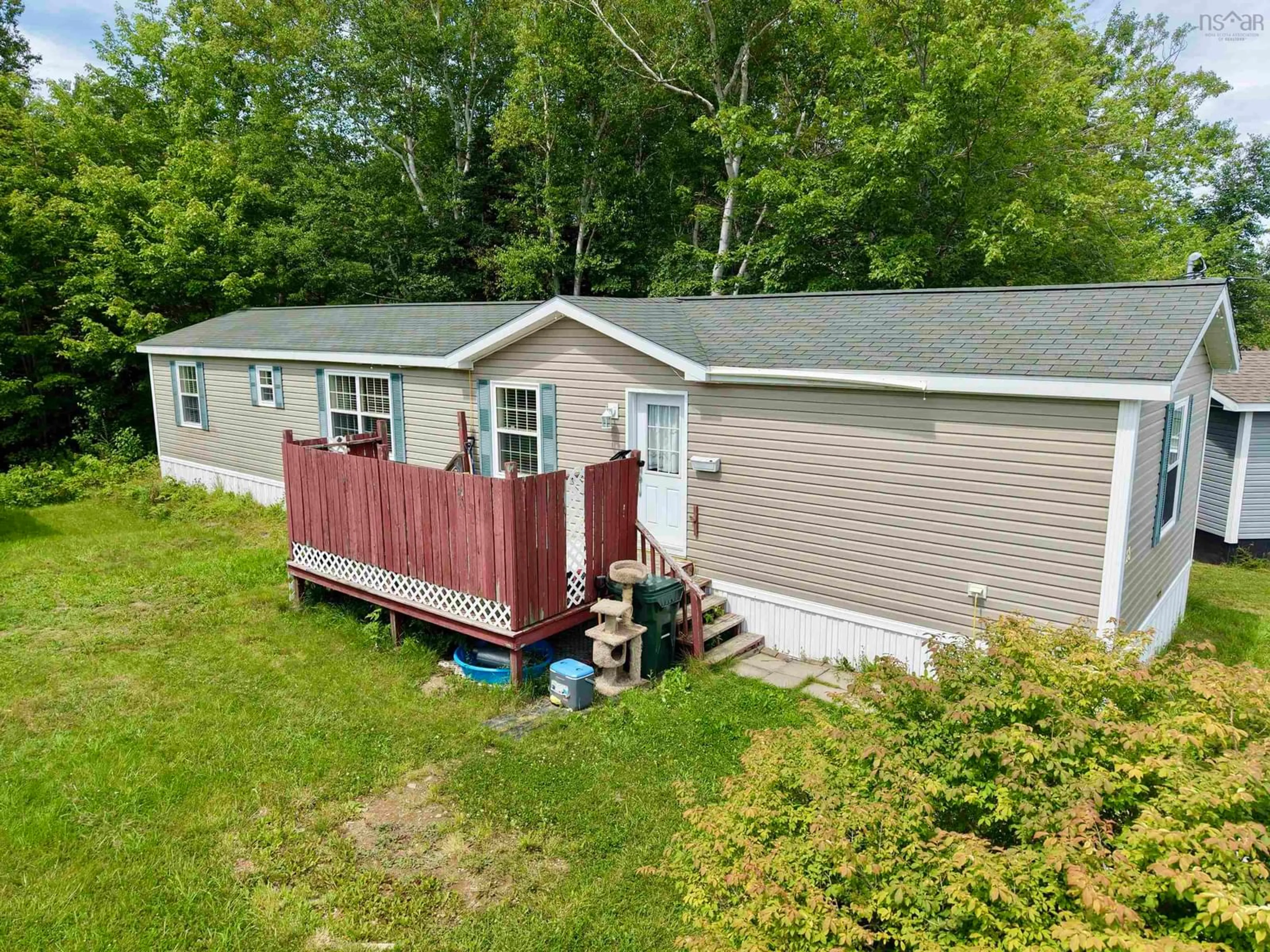 A pic from outside/outdoor area/front of a property/back of a property/a pic from drone, water/lake/river/ocean view for 28 Bendix St, Cape Breton Nova Scotia B1V 3C3