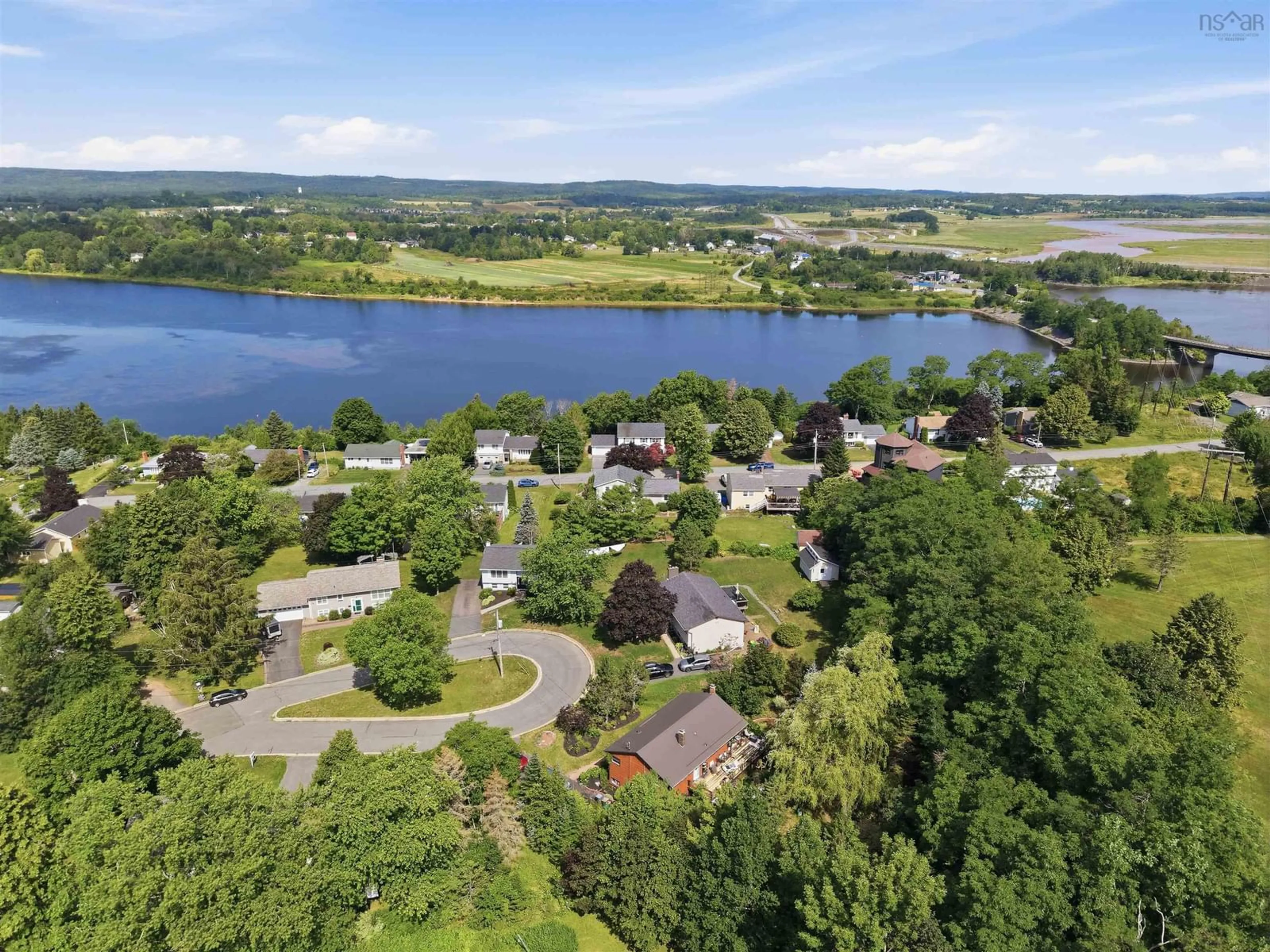 A pic from outside/outdoor area/front of a property/back of a property/a pic from drone, water/lake/river/ocean view for 8 Lakeview Drive, Windsor Nova Scotia B0N 2T0