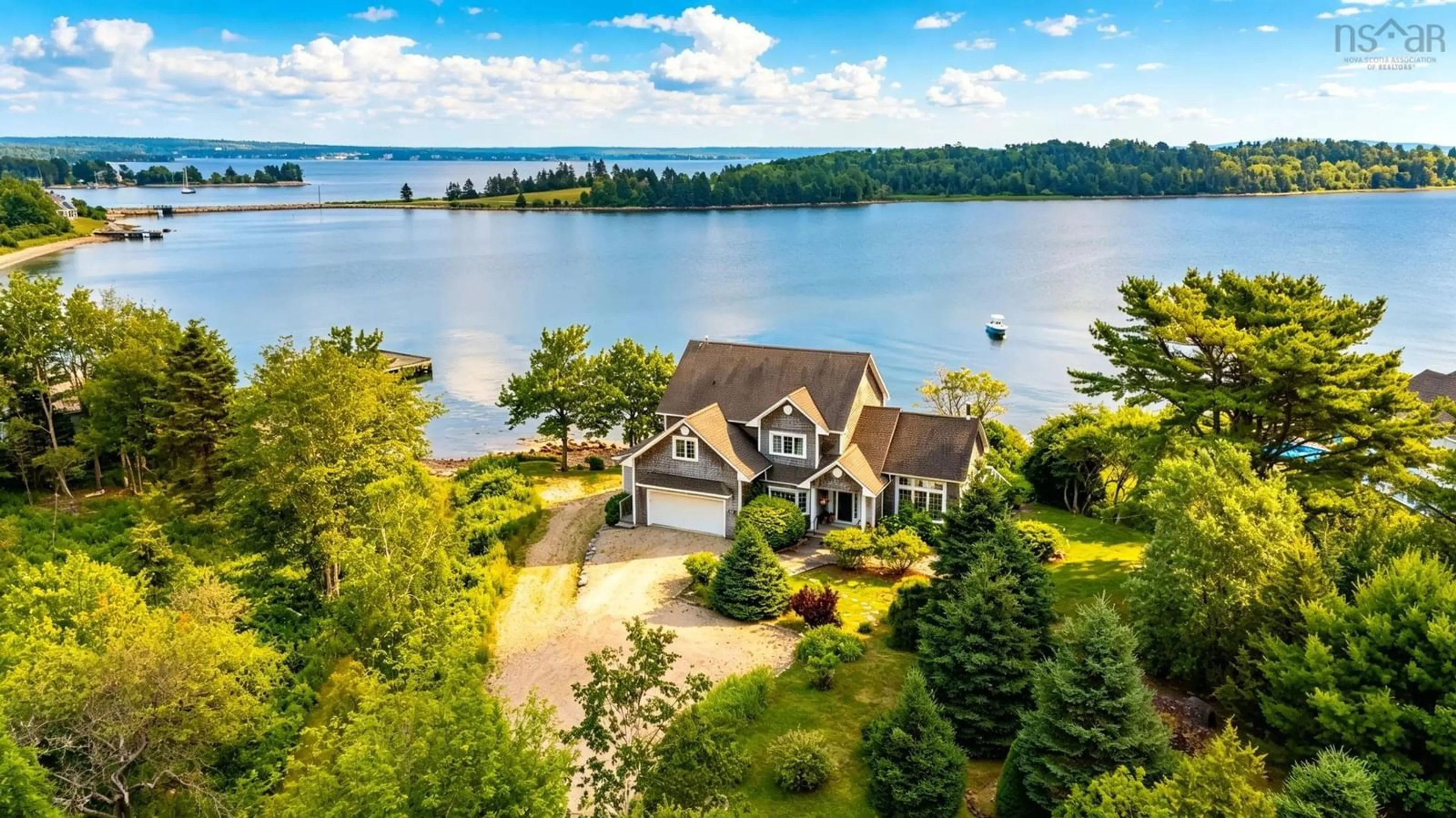 A pic from outside/outdoor area/front of a property/back of a property/a pic from drone, water/lake/river/ocean view for 3329 Highway 3, East Chester Nova Scotia B0J 1J0